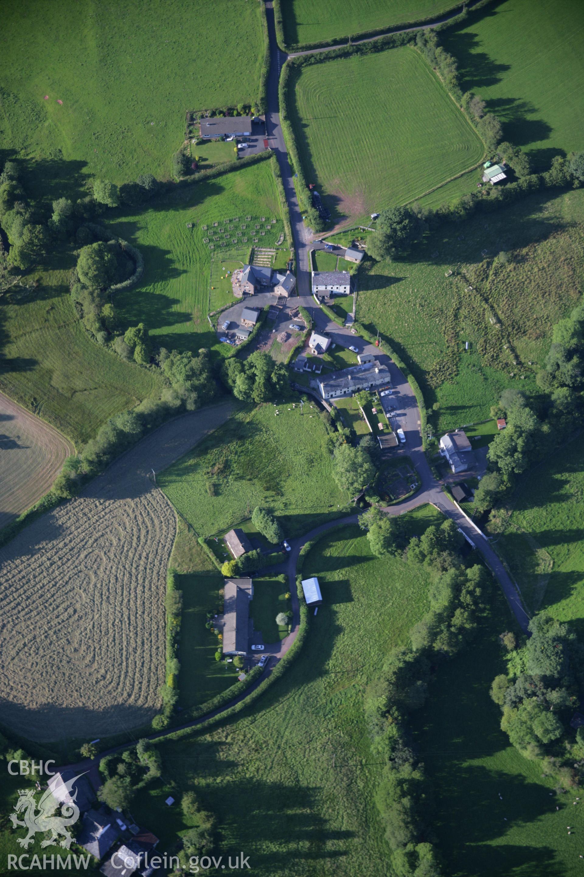 RCAHMW colour oblique aerial photograph of Pentre Bach village. Taken on 08 August 2007 by Toby Driver