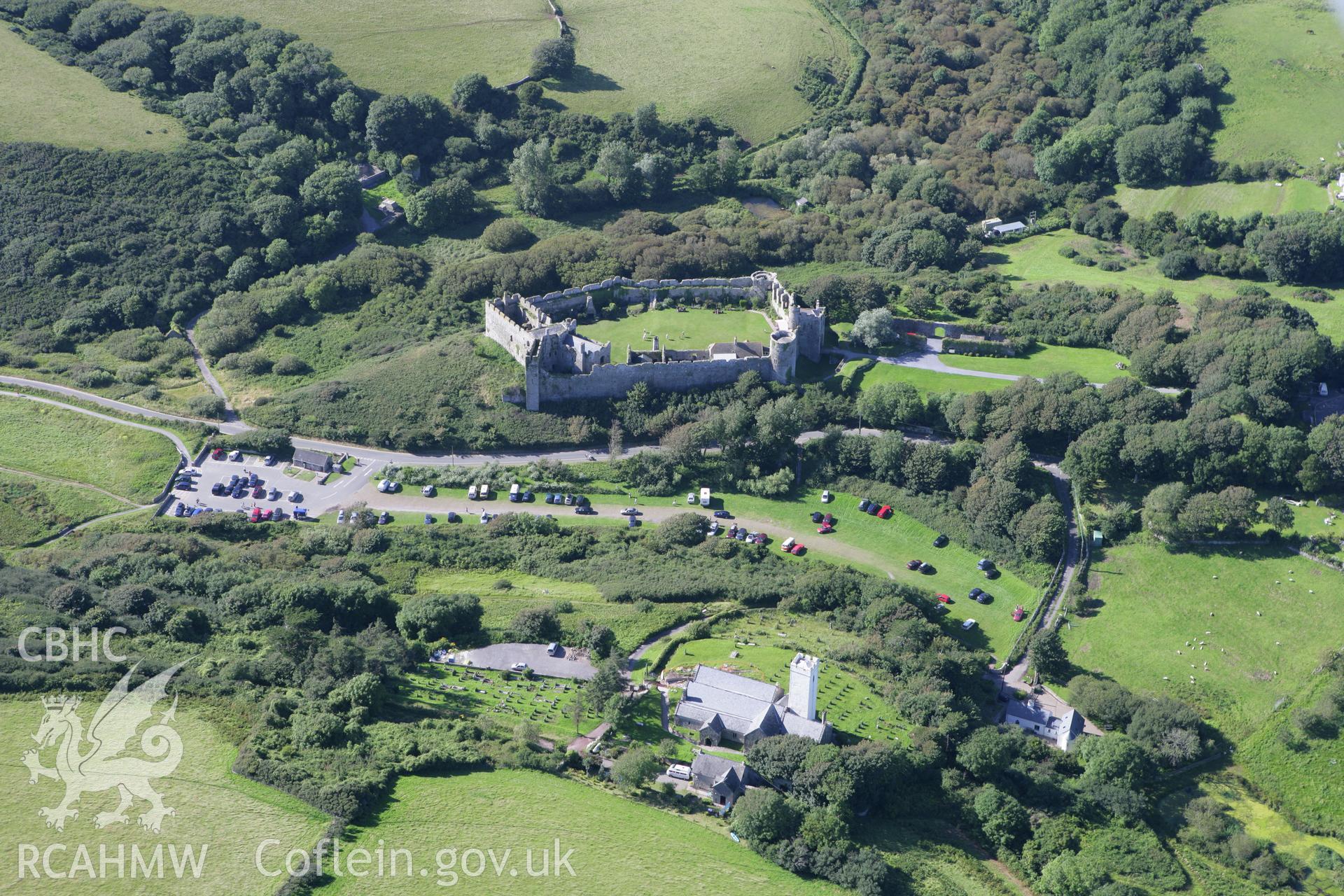 RCAHMW colour oblique aerial photograph of Manorbier Castle, viewed from the south-east. Taken on 30 July 2007 by Toby Driver