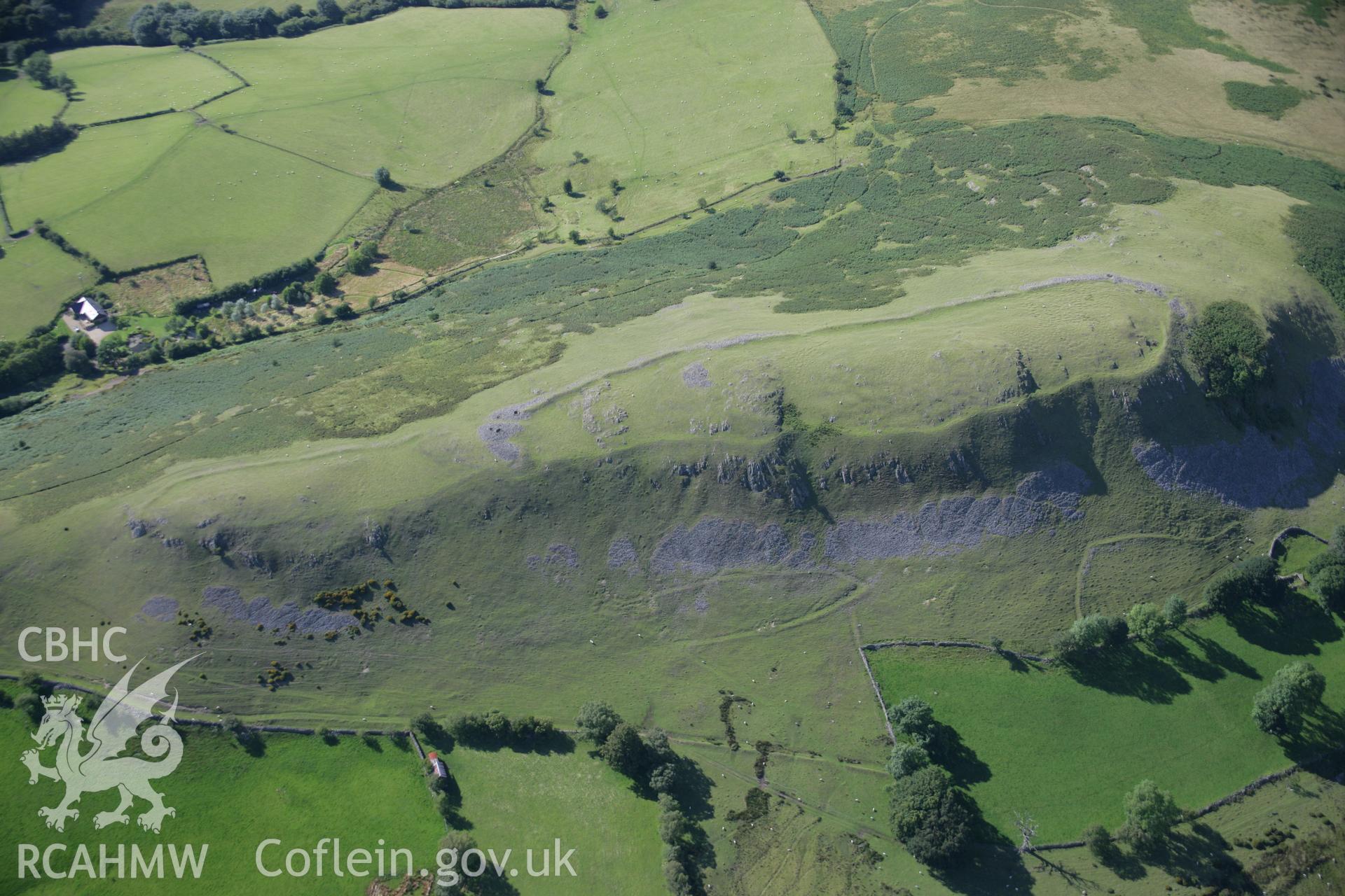 RCAHMW colour oblique aerial photograph of Castle Bank Hillfort. Taken on 08 August 2007 by Toby Driver