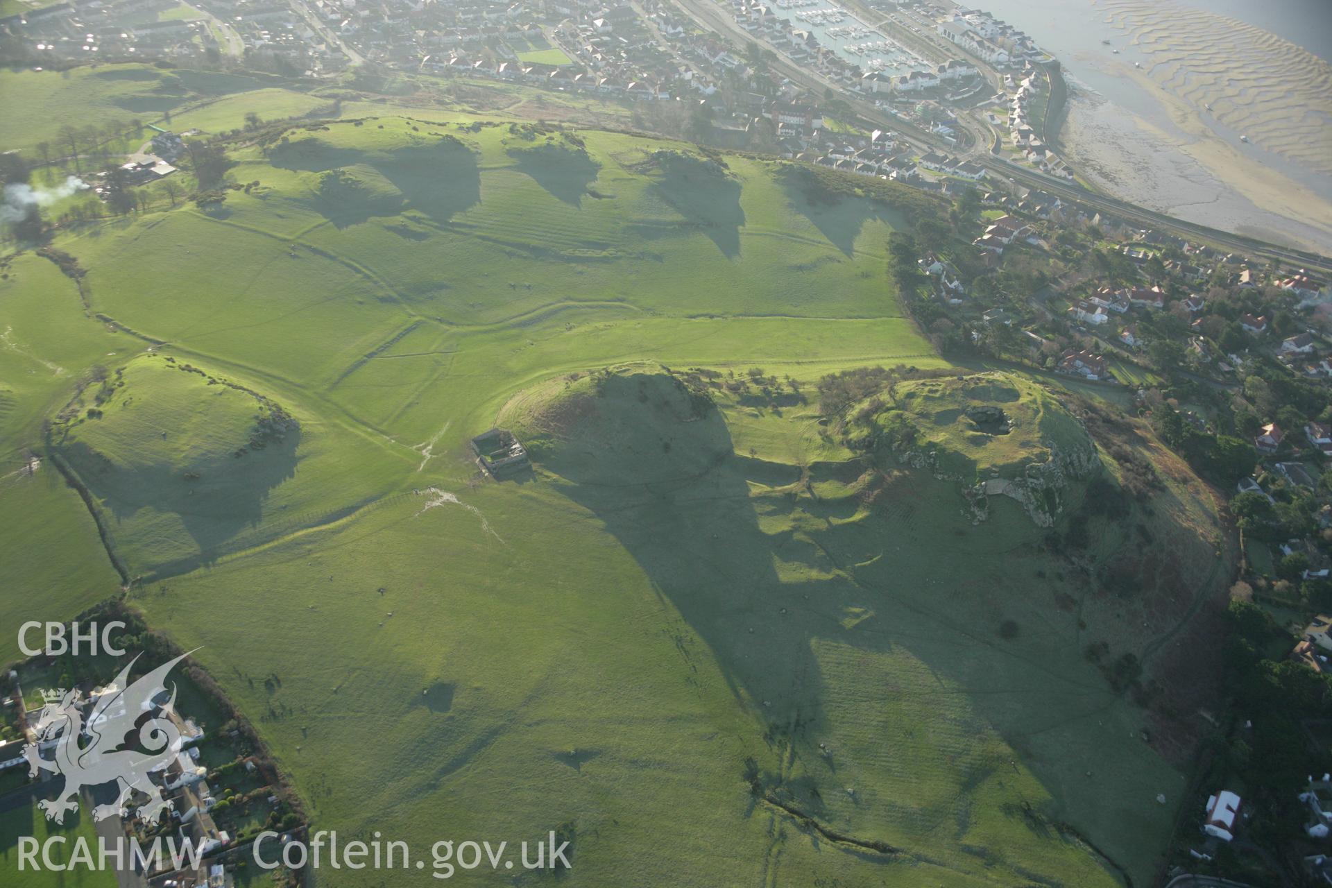 RCAHMW colour oblique aerial photograph of Deganwy Castle. Taken on 25 January 2007 by Toby Driver