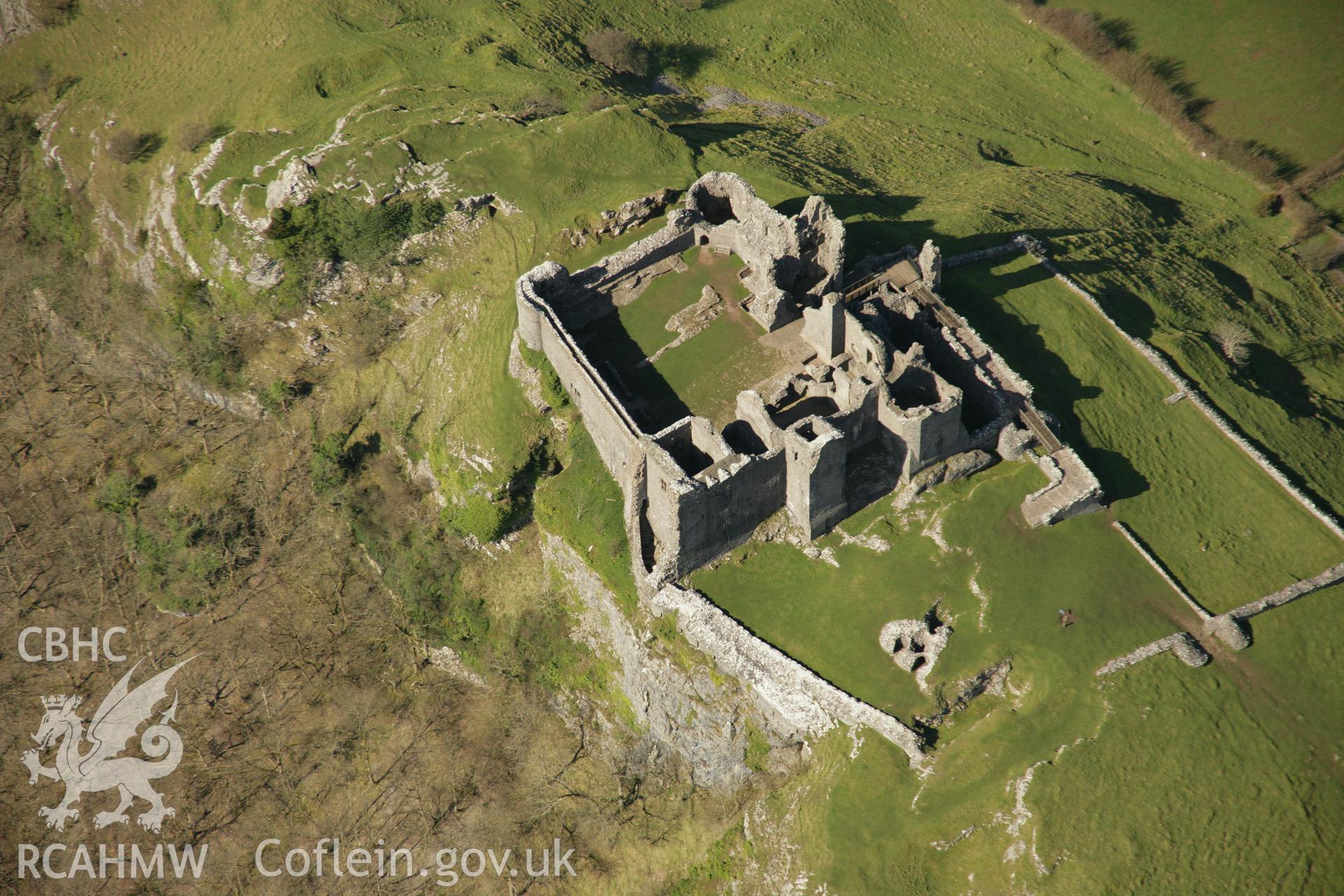 RCAHMW colour oblique aerial photograph of Carreg Cennen Castle. Taken on 21 March 2007 by Toby Driver