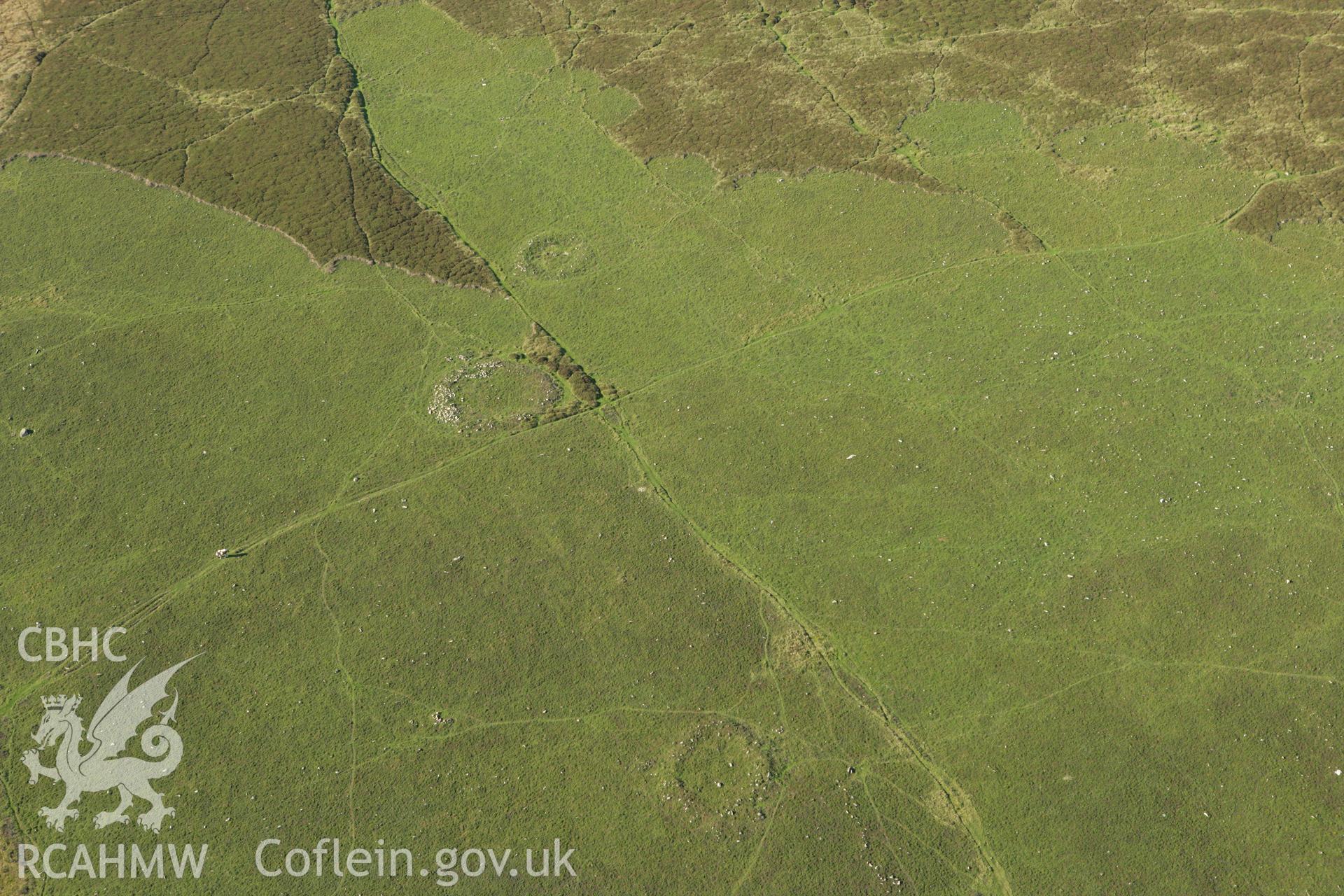 RCAHMW colour oblique photograph of Carn Ingli common hut circles. Taken by Toby Driver on 23/10/2007.