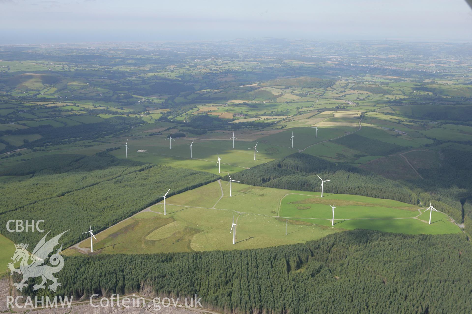 RCAHMW colour oblique aerial photograph of Tir Mostyn Windfarm. Taken on 31 July 2007 by Toby Driver