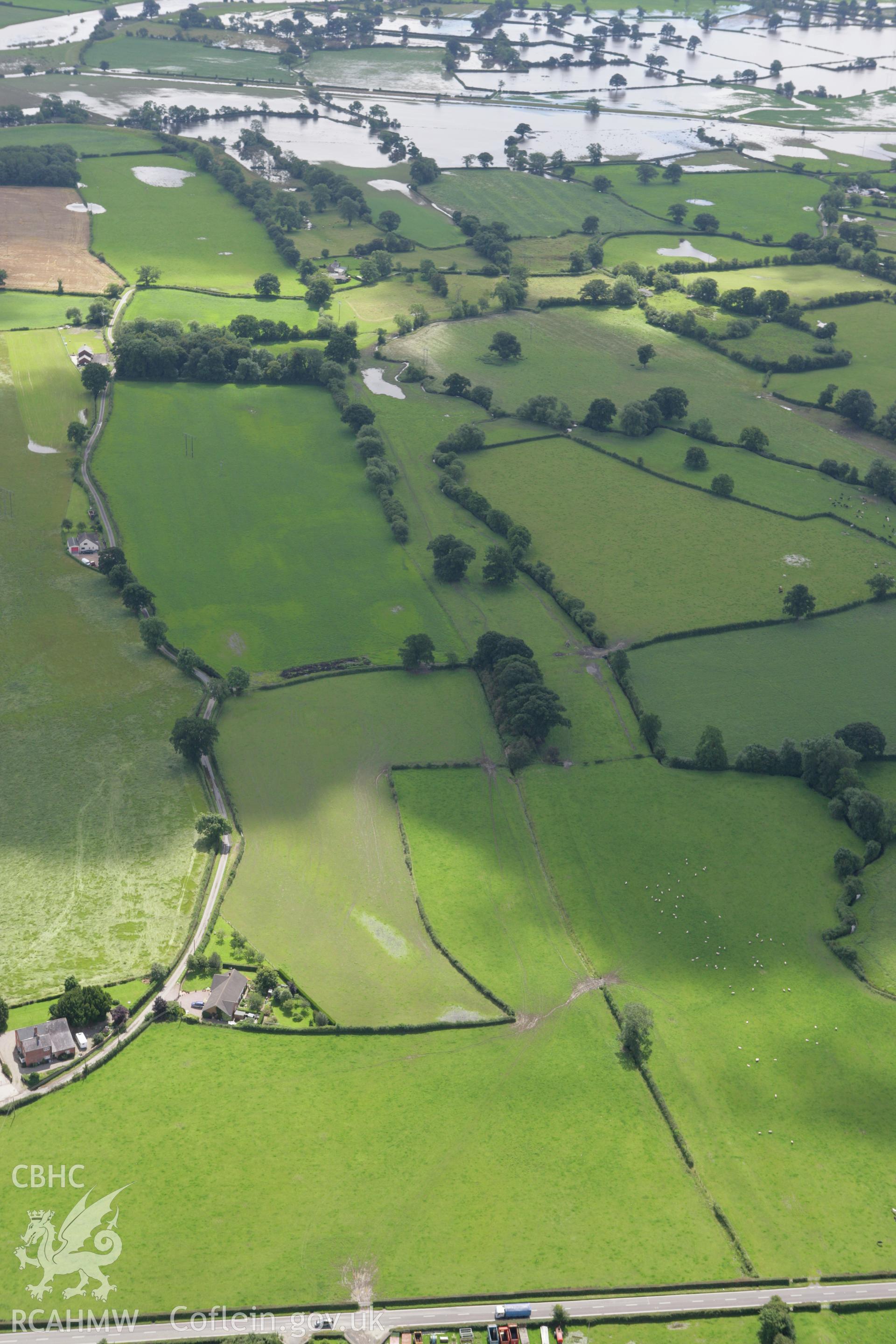 RCAHMW colour oblique aerial photograph of a section of Offa's Dyke extending 3000m southeast to Bele Brook, Llandrinio. Taken on 24 July 2007 by Toby Driver
