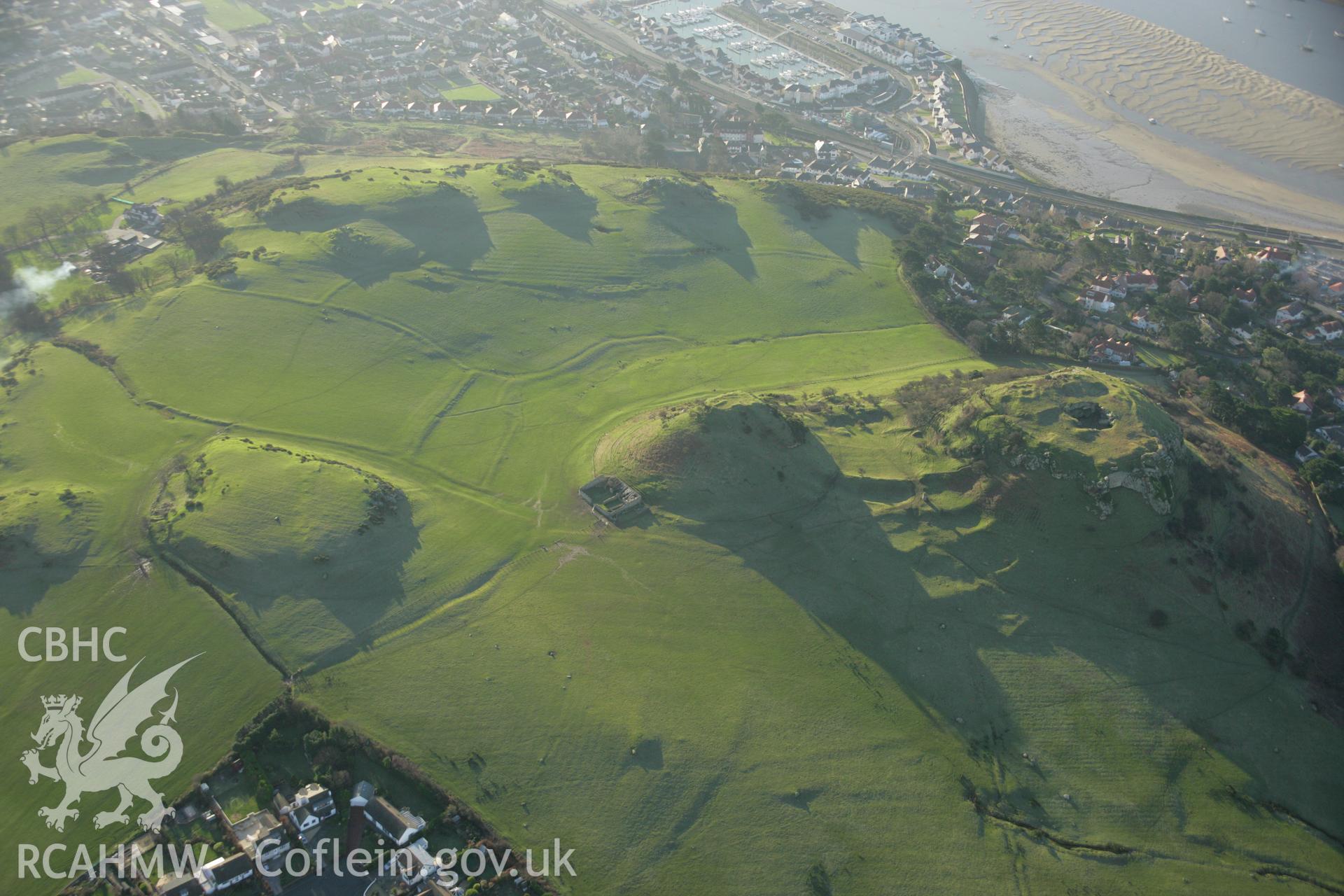 RCAHMW colour oblique aerial photograph of Deganwy Castle. Taken on 25 January 2007 by Toby Driver
