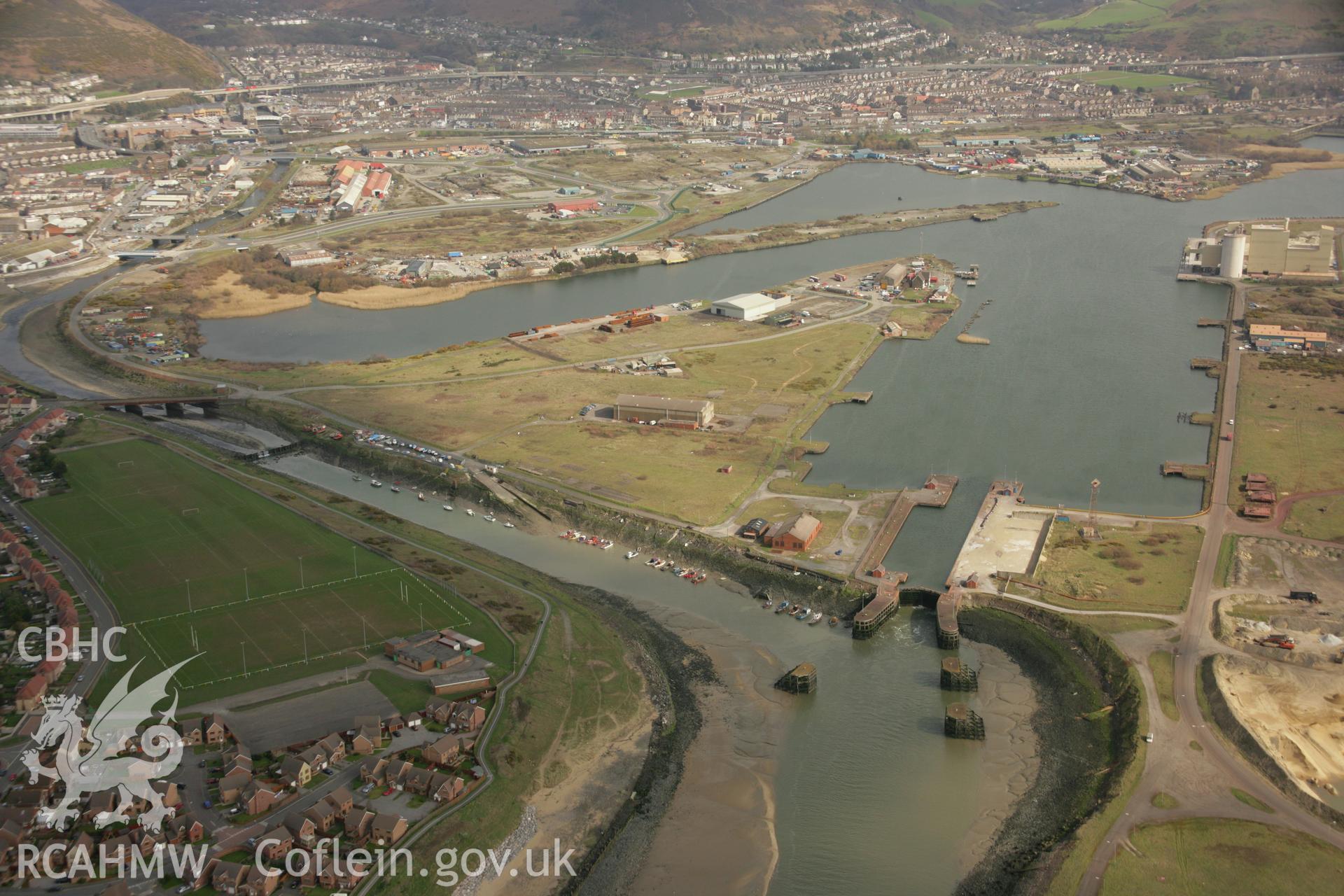 RCAHMW colour oblique aerial photograph of Port Talbot Docks. Taken on 16 March 2007 by Toby Driver