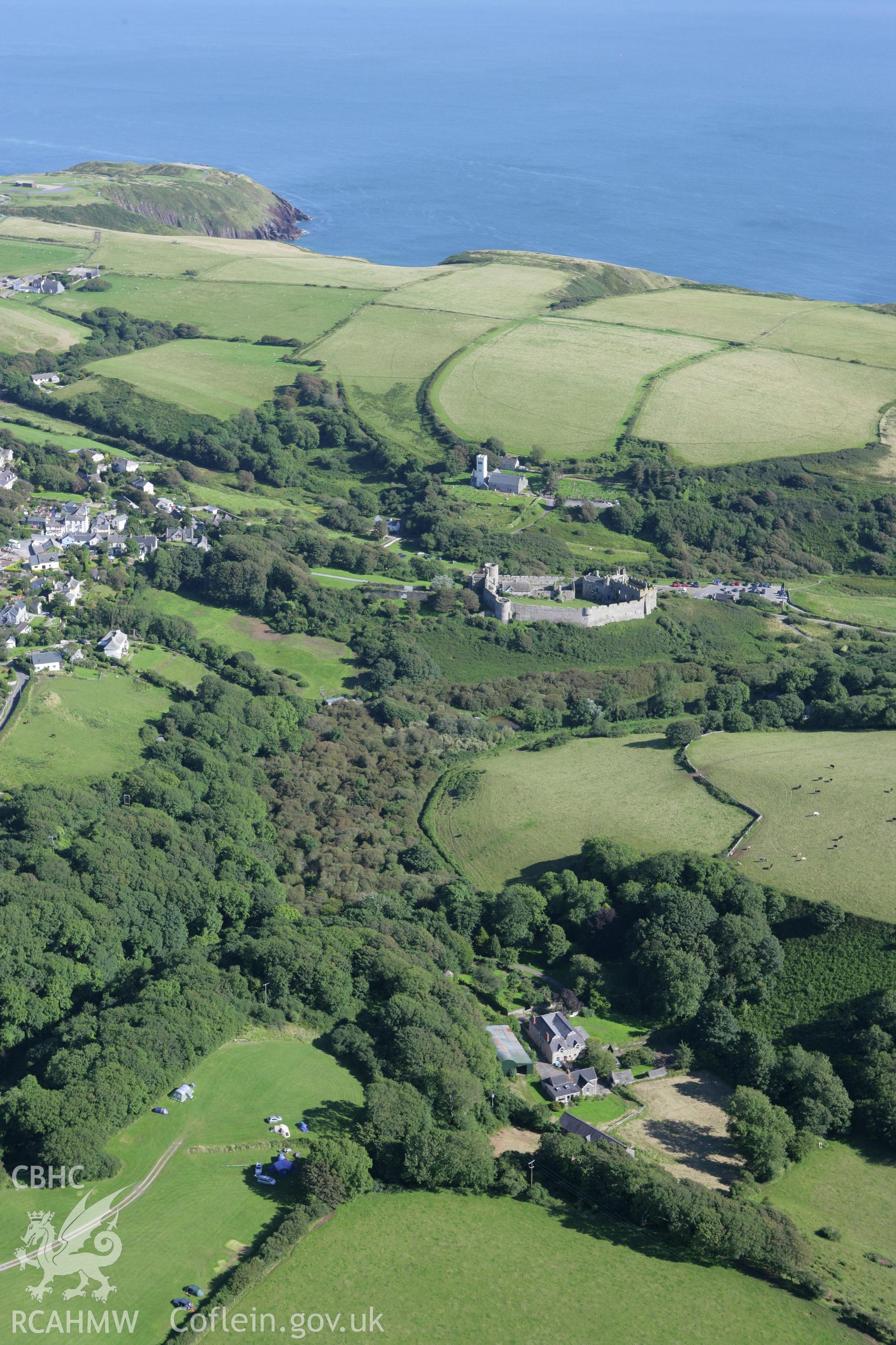 RCAHMW colour oblique aerial photograph of Manorbier Castle, viewed from the north-west. Taken on 30 July 2007 by Toby Driver