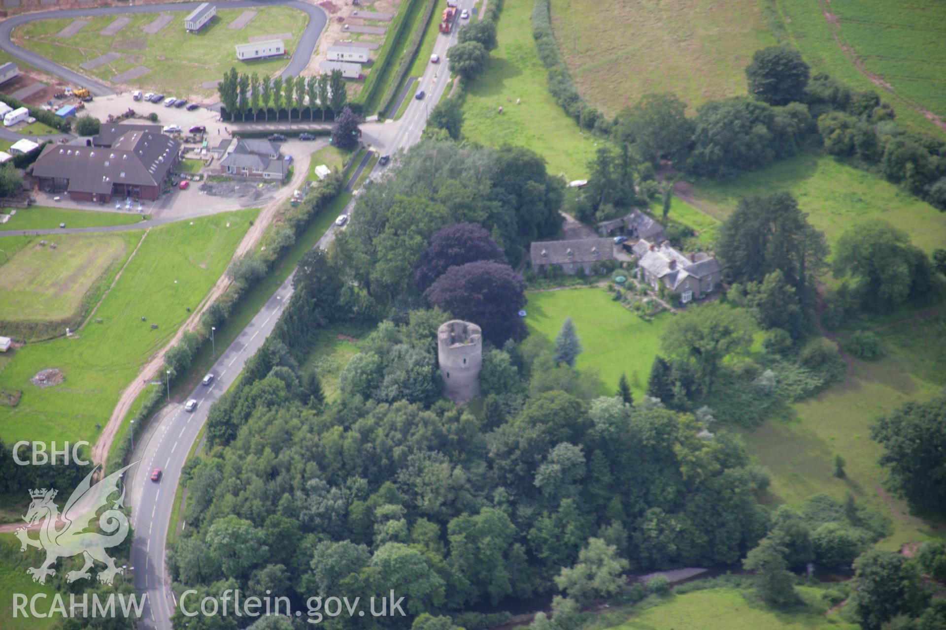 RCAHMW colour oblique aerial photograph of Bronllys Castle. Taken on 09 July 2007 by Toby Driver