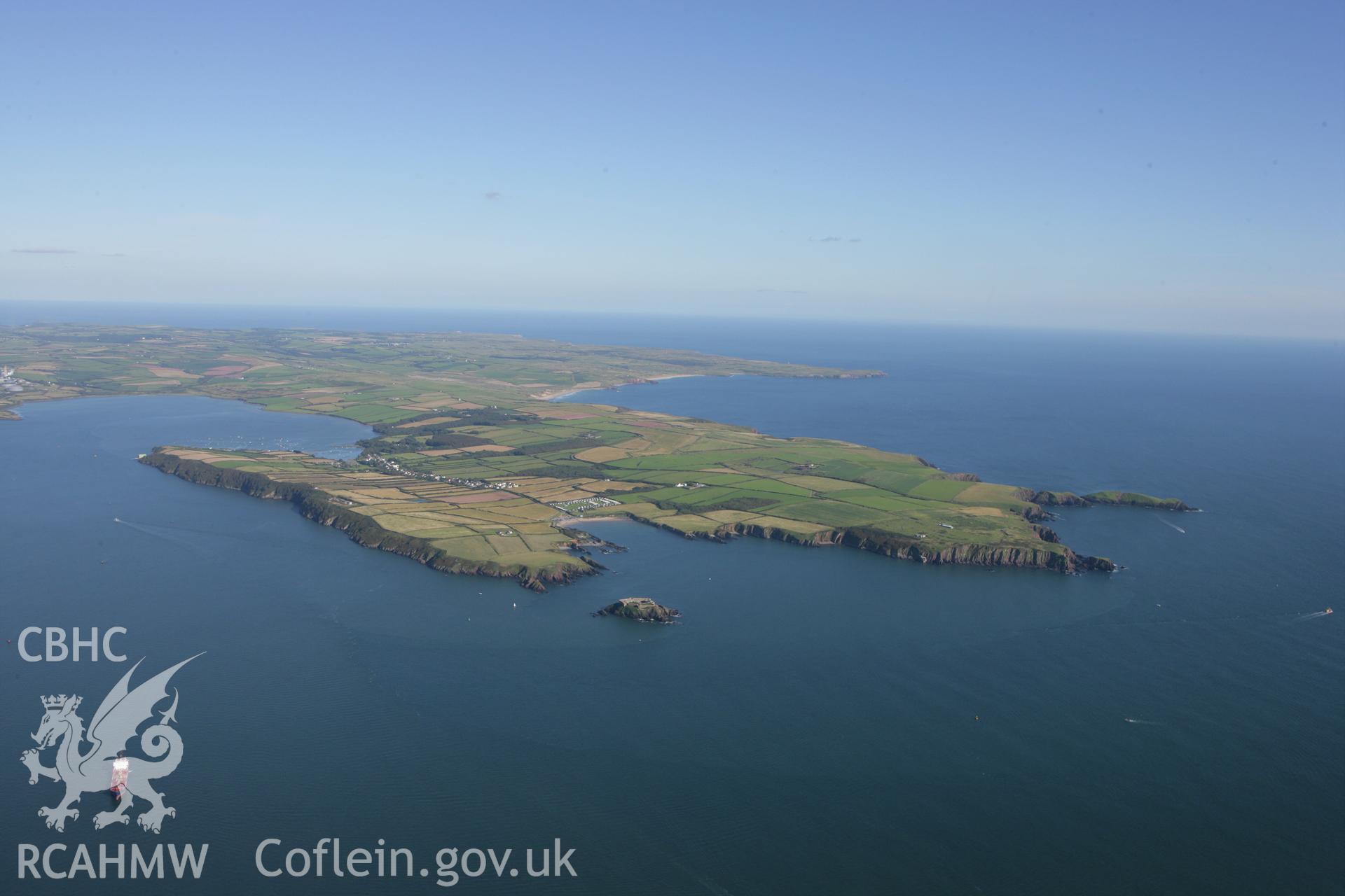 RCAHMW colour oblique aerial photograph of Milford Haven Waterway, looking east to Angle. Taken on 30 July 2007 by Toby Driver