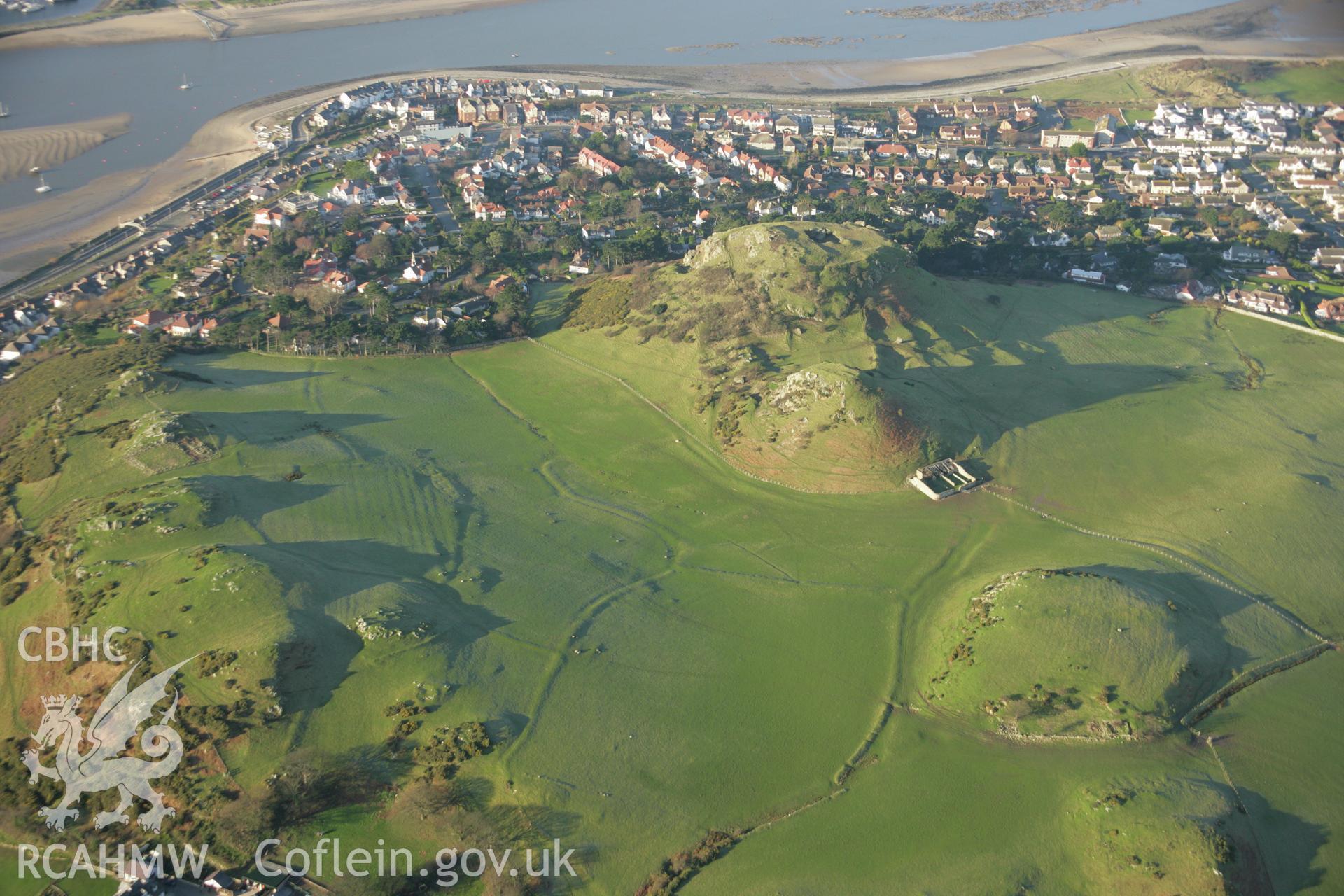 RCAHMW colour oblique aerial photograph of Deganwy Castle and of earthworks of settlement features north-east of the Castle. Taken on 25 January 2007 by Toby Driver
