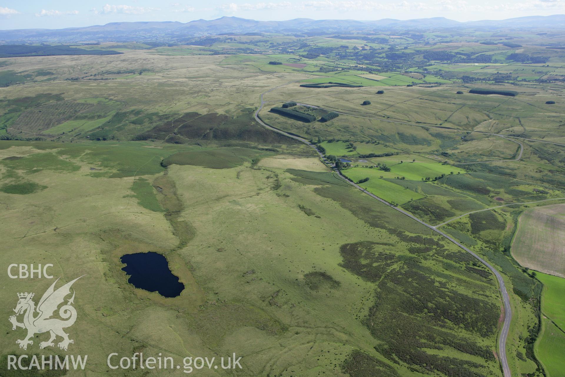 RCAHMW colour oblique aerial photograph of Cwm Owen landscape. Taken on 08 August 2007 by Toby Driver