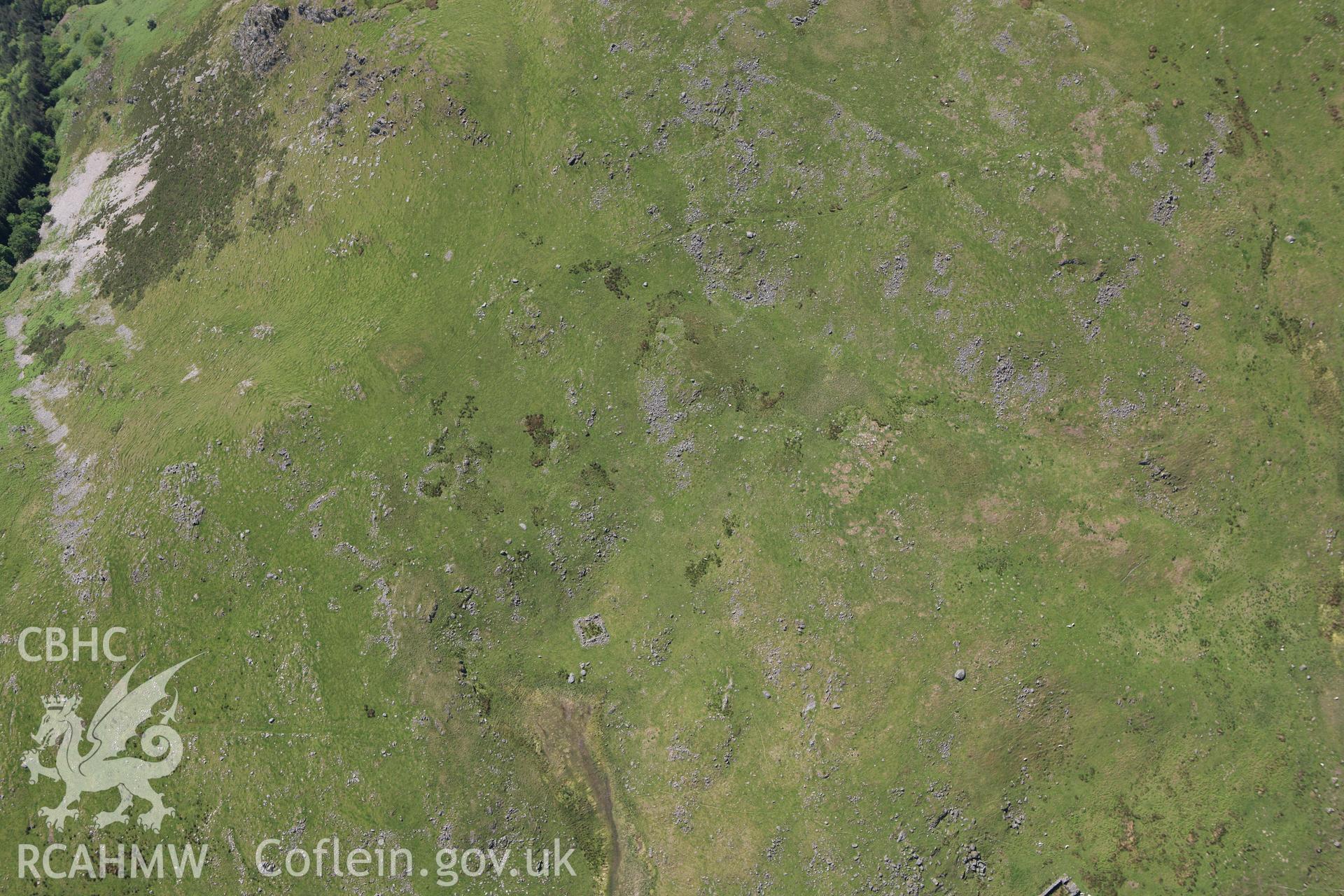RCAHMW colour oblique aerial photograph of Craig Tyn-y-Cornel Settlement. Taken on 02 June 2009 by Toby Driver