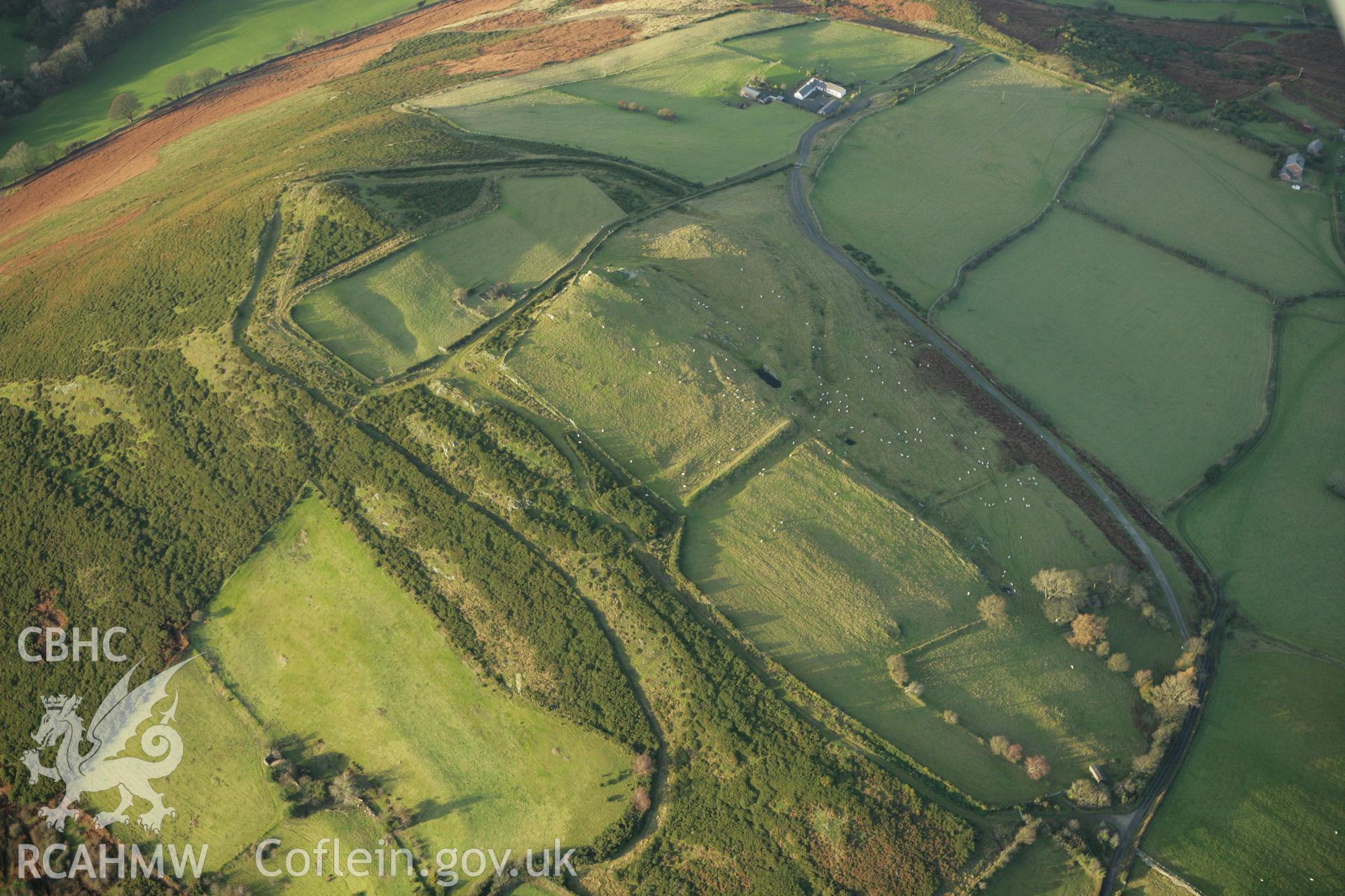 RCAHMW colour oblique photograph of Mynydd y Gaer hillfort. Taken by Toby Driver on 10/12/2009.
