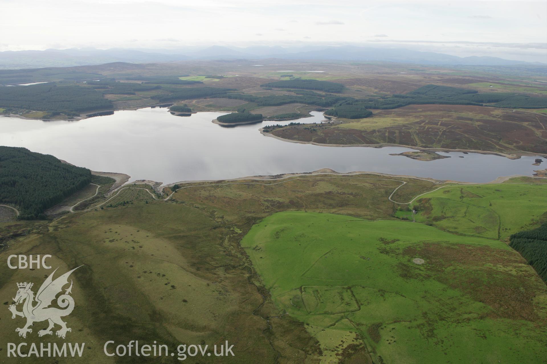 RCAHMW colour oblique aerial photograph of Hen Ddinbych showing landscape looking west towards Llyn Brenig Taken on 13 October 2009 by Toby Driver