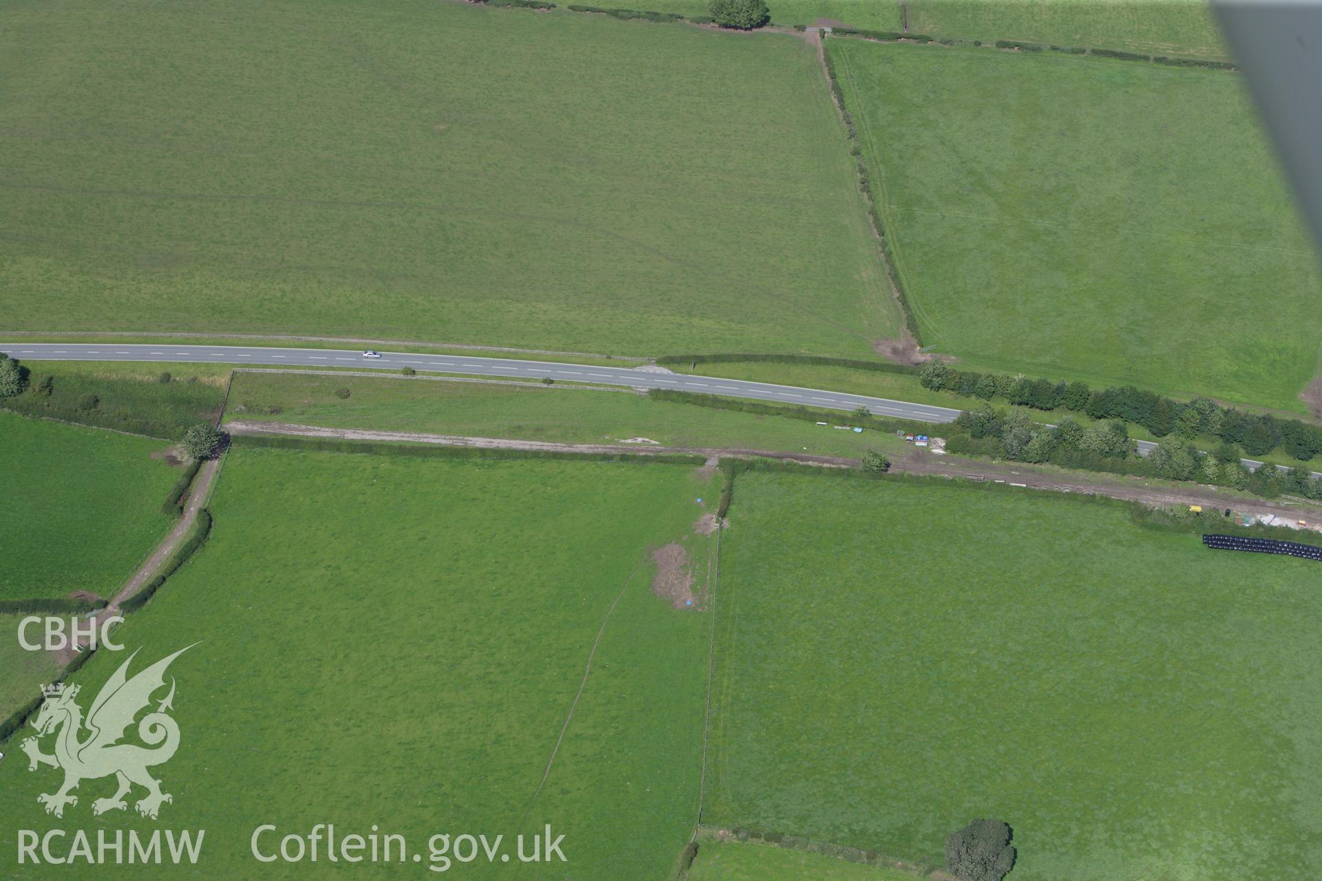 RCAHMW colour oblique aerial photograph of a section of Offa's Dyke or Whitford Dyke, northwest of Tre Abbot-Fawr. Taken on 30 July 2009 by Toby Driver