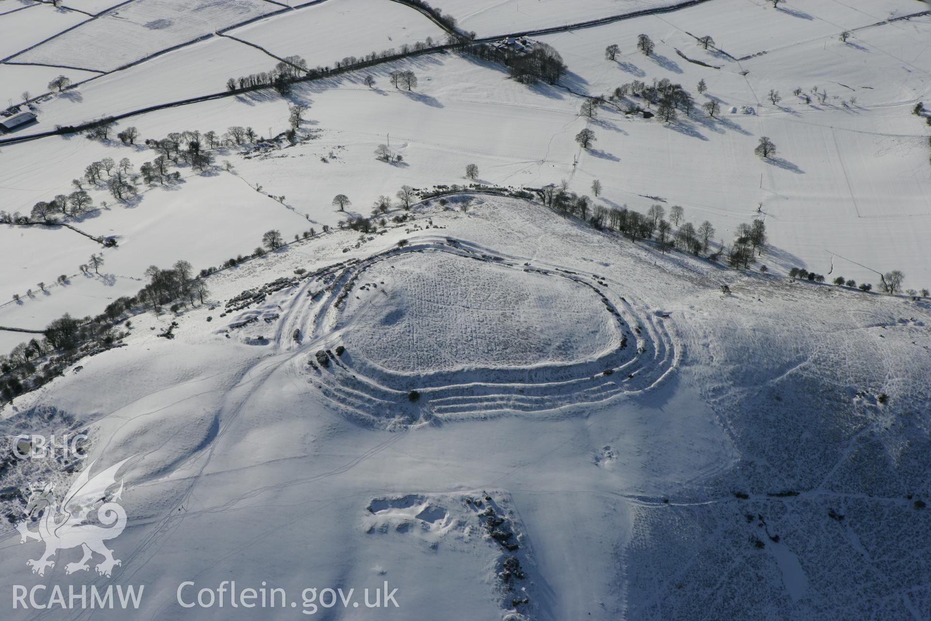 RCAHMW colour oblique photograph of Pen y Crug hillfort. Taken by Toby Driver on 06/02/2009.