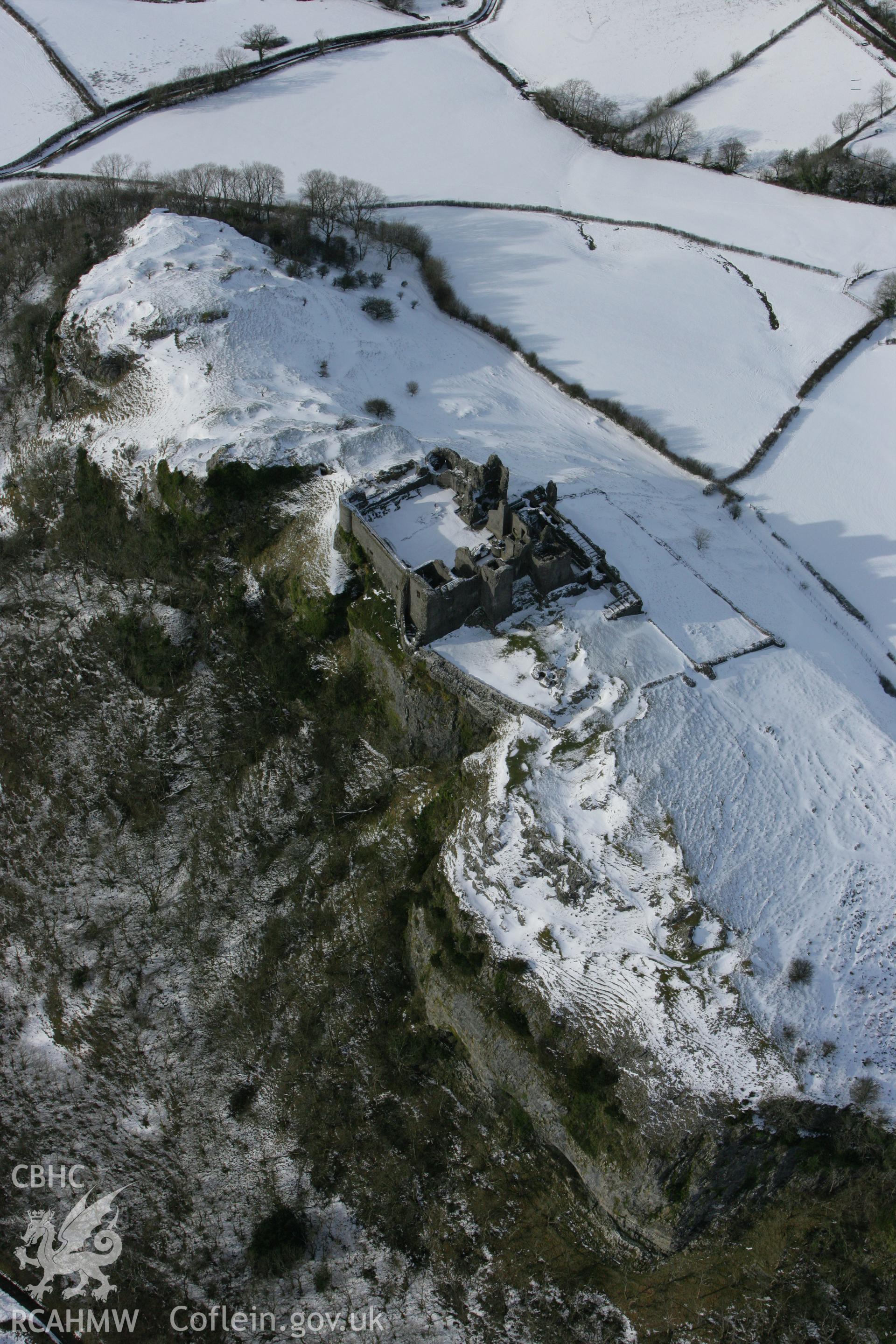 RCAHMW colour oblique photograph of Carreg Cennan Castle, under snow. Taken by Toby Driver on 06/02/2009.