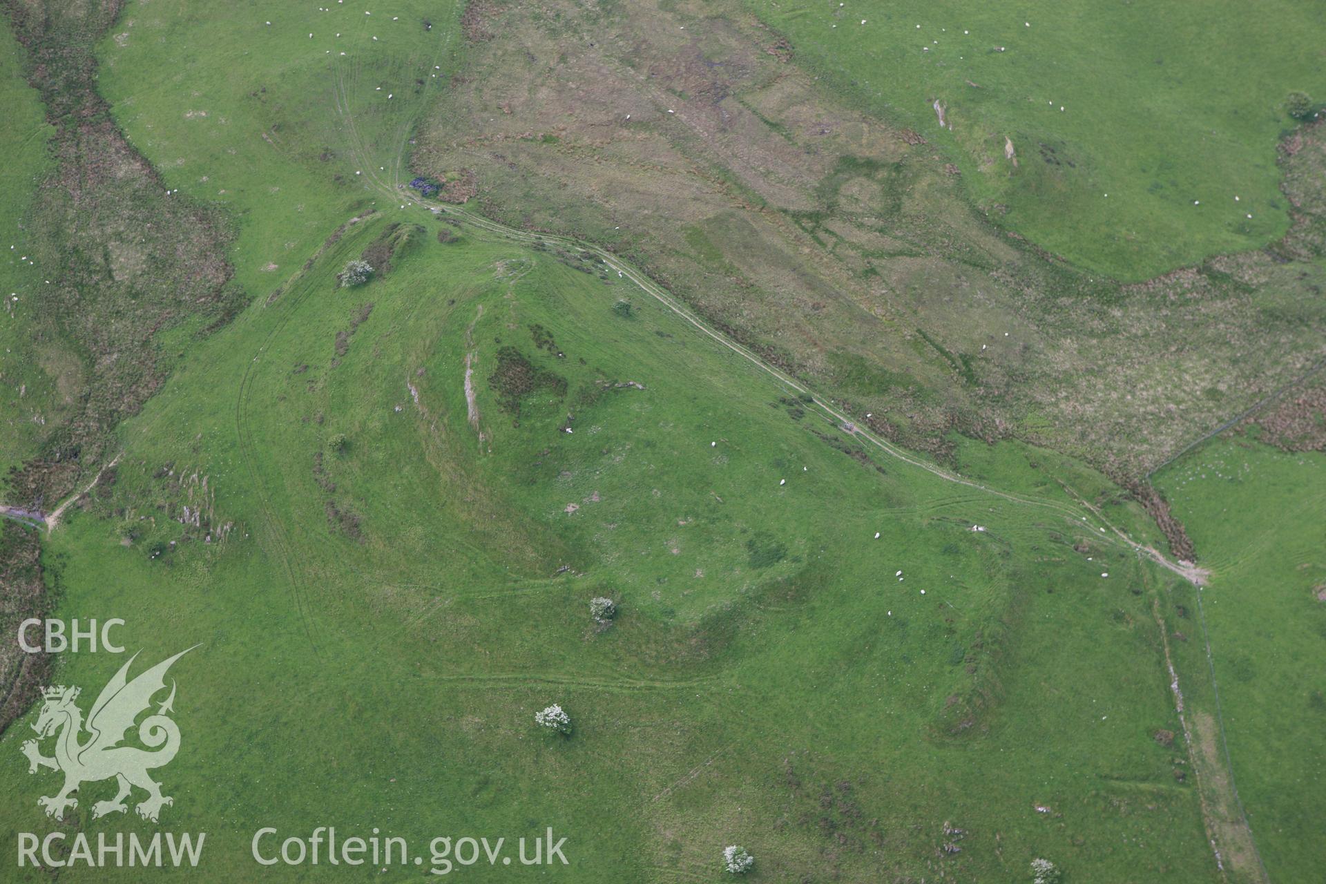 RCAHMW colour oblique aerial photograph of Pen Dinas. Taken on 02 June 2009 by Toby Driver
