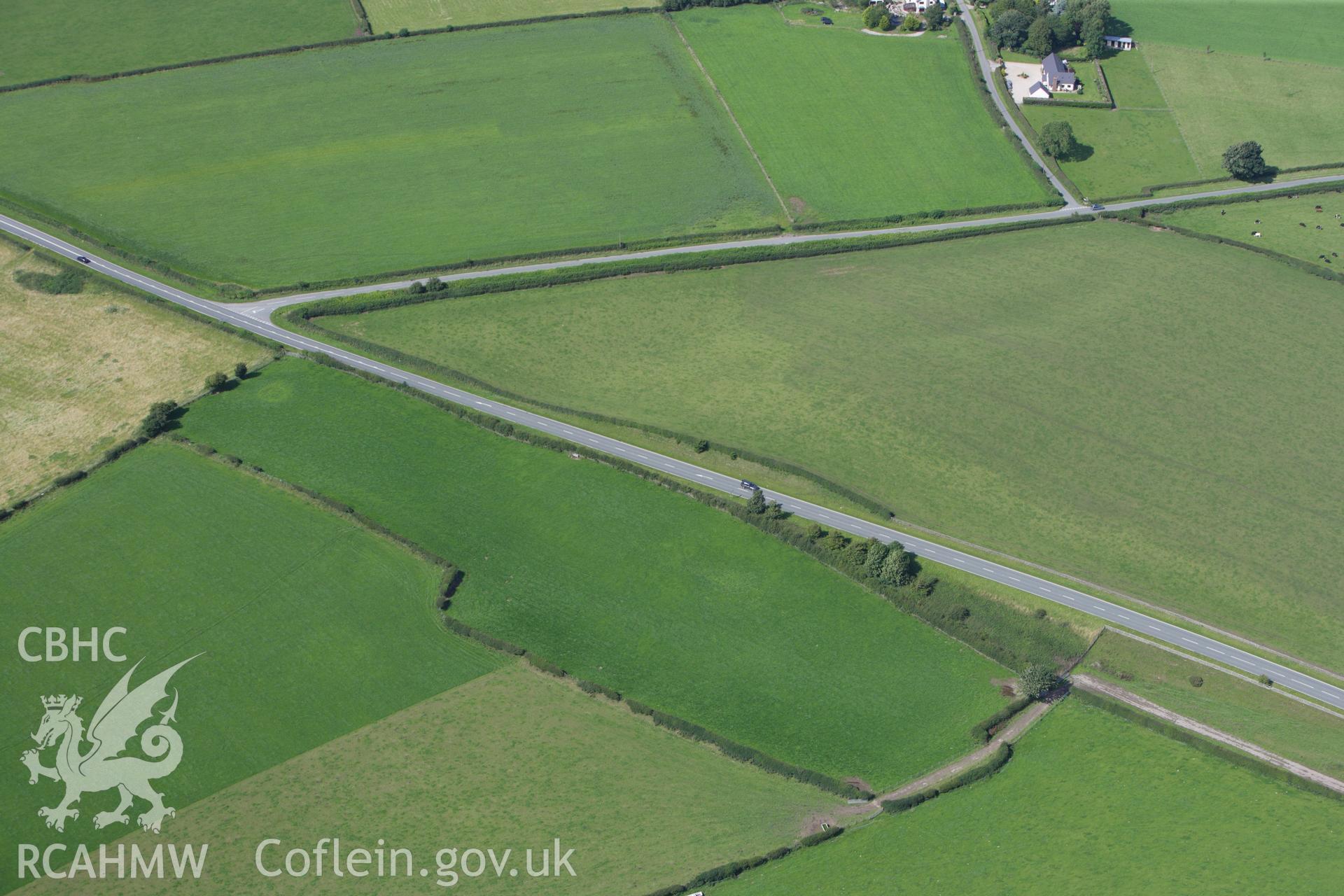 RCAHMW colour oblique aerial photograph of a section of Offa's Dyke or Whitford Dyke, northwest of Tre Abbot-Fawr. Taken on 30 July 2009 by Toby Driver