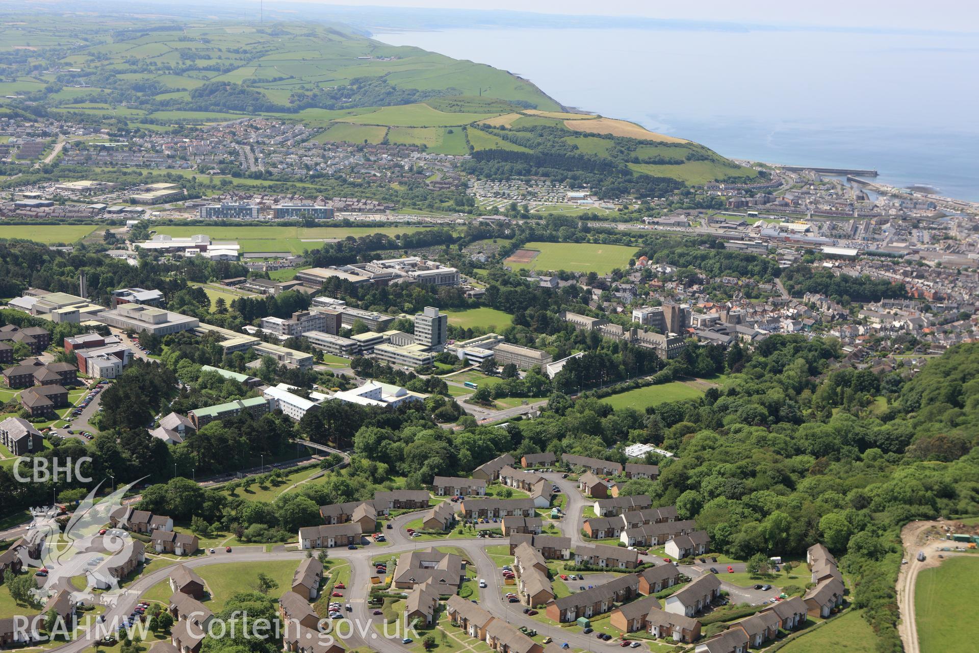 RCAHMW colour oblique aerial photograph of Aberystwyth and surrounding landscape. Taken on 02 June 2009 by Toby Driver