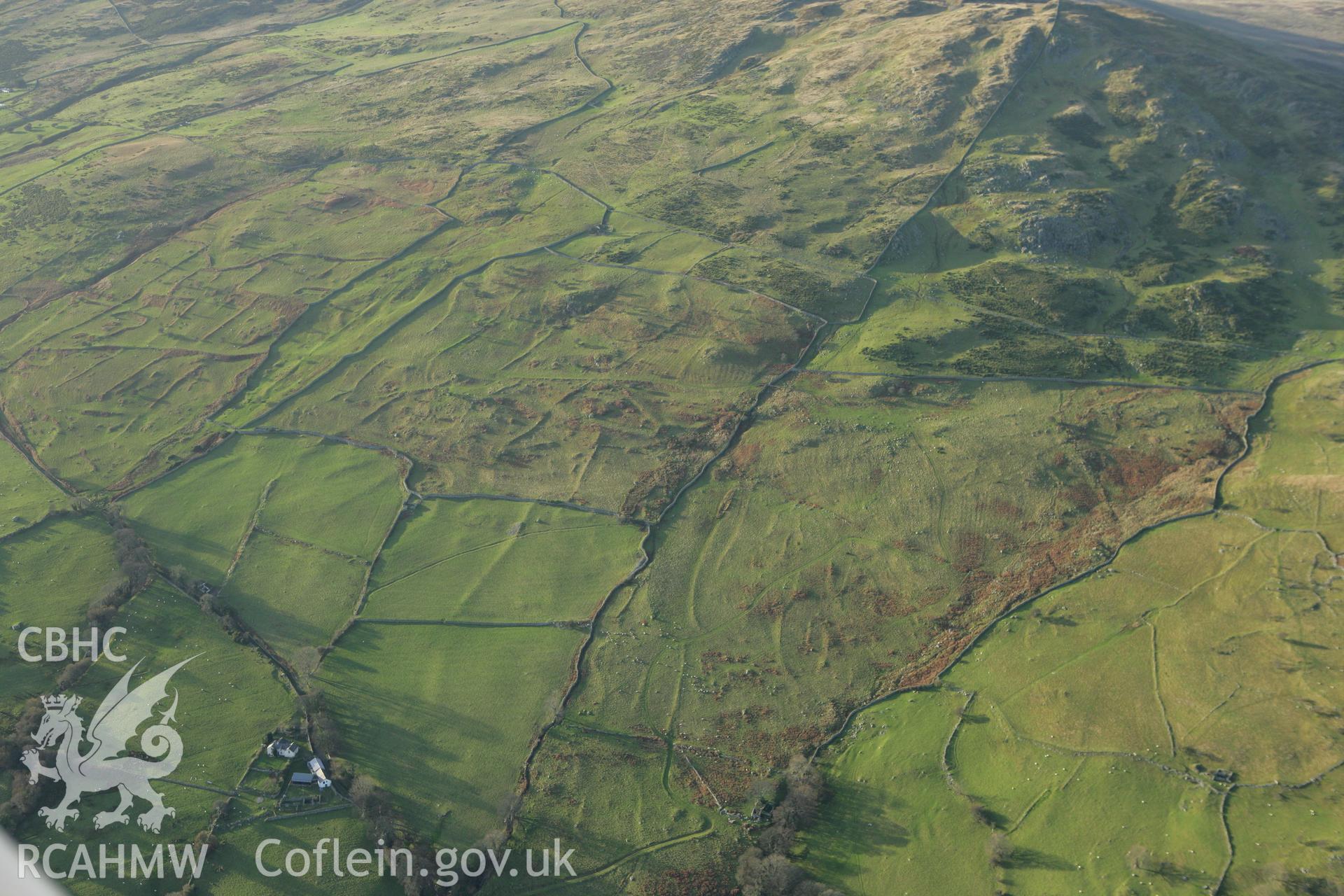 RCAHMW colour oblique aerial photograph of Maen-y-Bardd Settlement and field systems Taken on 10 December 2009 by Toby Driver