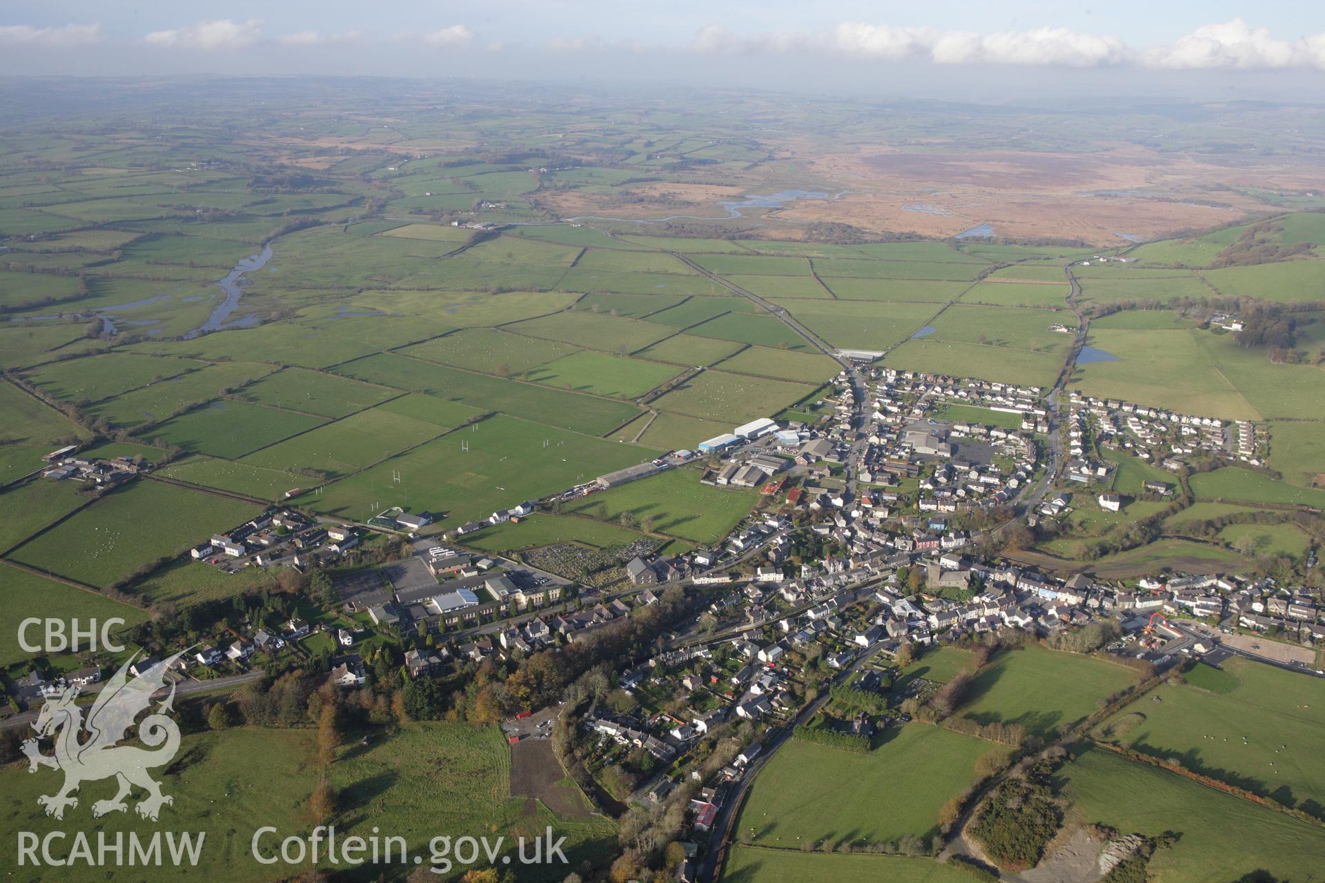 RCAHMW colour oblique aerial photograph of Tregaron from the south. Taken on 09 November 2009 by Toby Driver