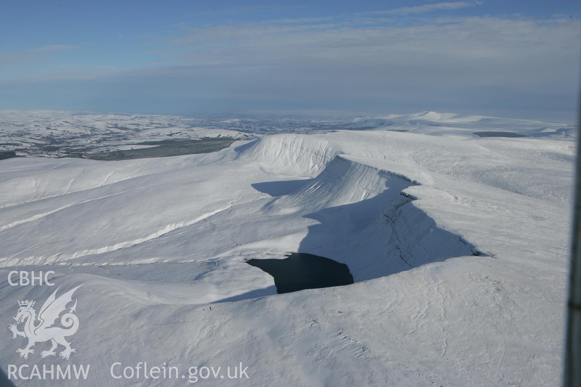 RCAHMW colour oblique photograph of Llyn y Fan Fach, winter landscape. Taken by Toby Driver on 06/02/2009.