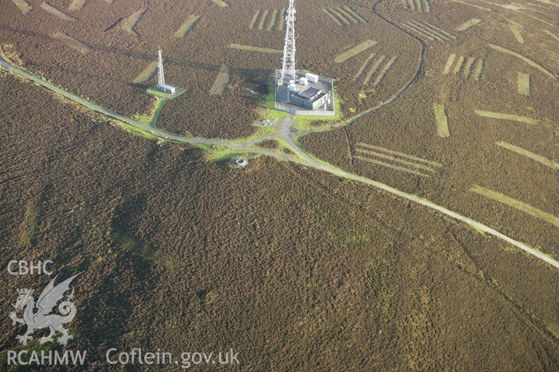 RCAHMW colour oblique aerial photograph of Cryn-y-Brain Cairn II and Wireless Station Cairn II. Taken on 10 December 2009 by Toby Driver
