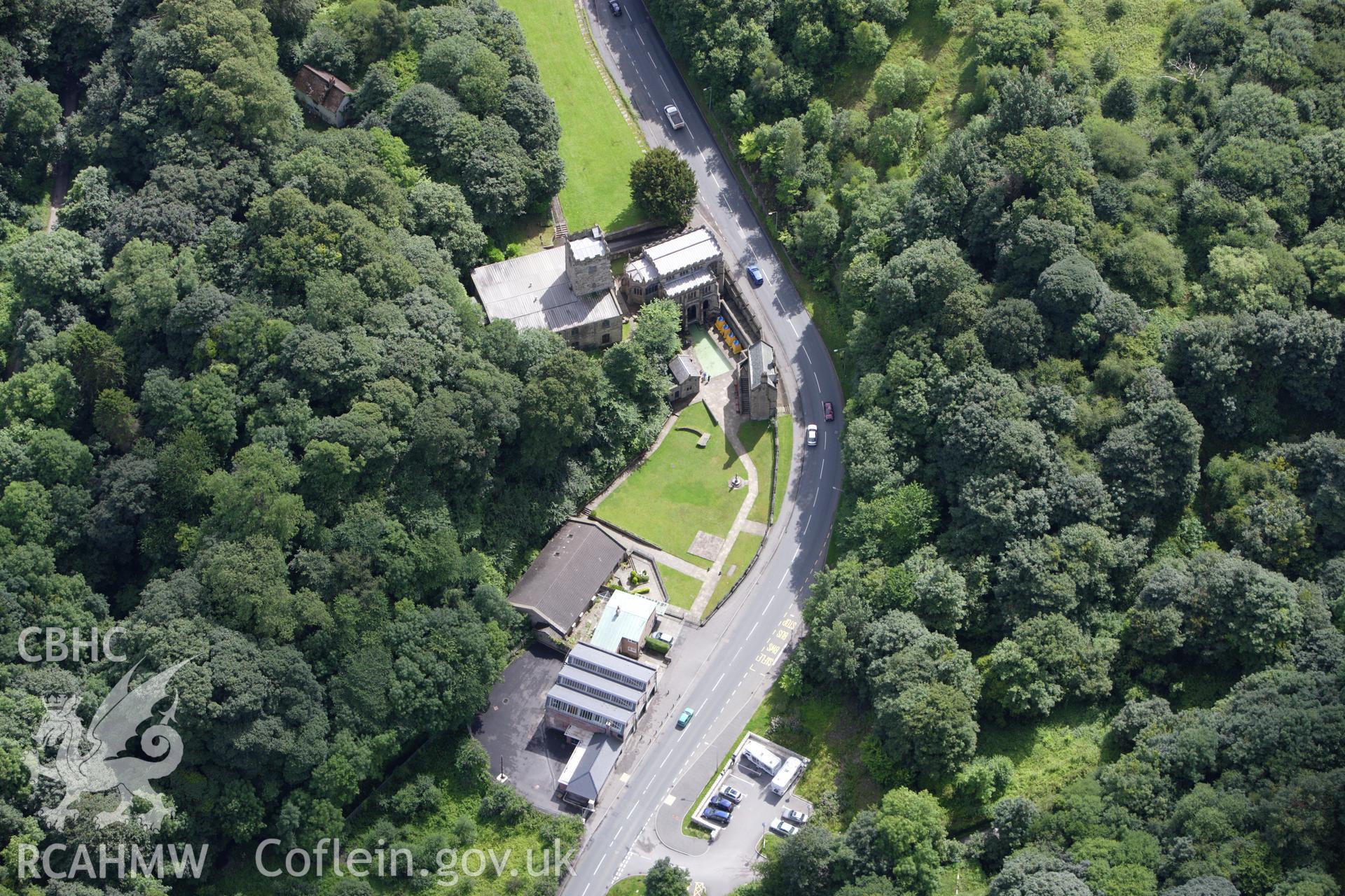 RCAHMW colour oblique aerial photograph of St Winifride's Well and Well Chapel. Taken on 30 July 2009 by Toby Driver