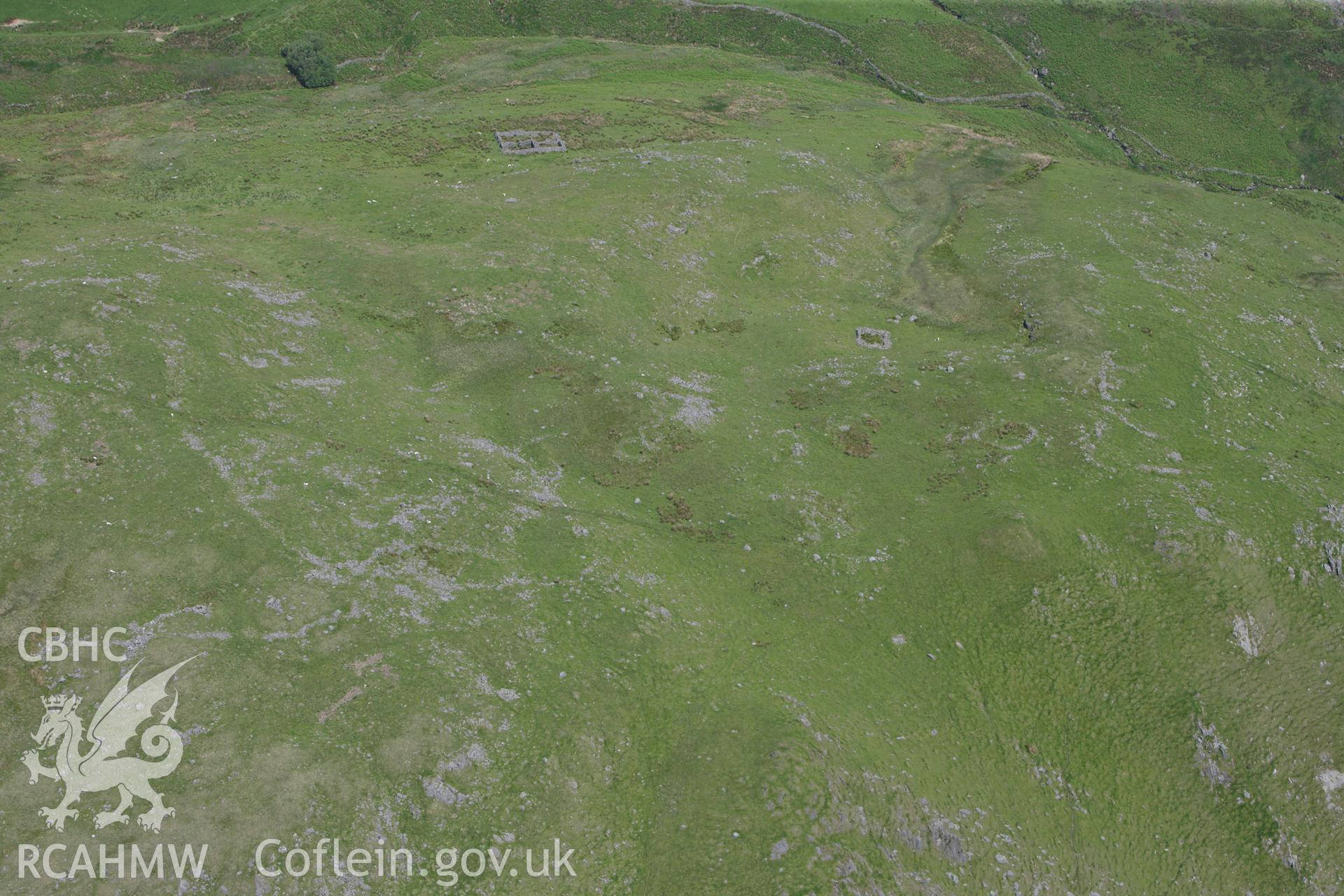 RCAHMW colour oblique aerial photograph of Craig Tyn-y-Cornel Settlement. Taken on 02 June 2009 by Toby Driver