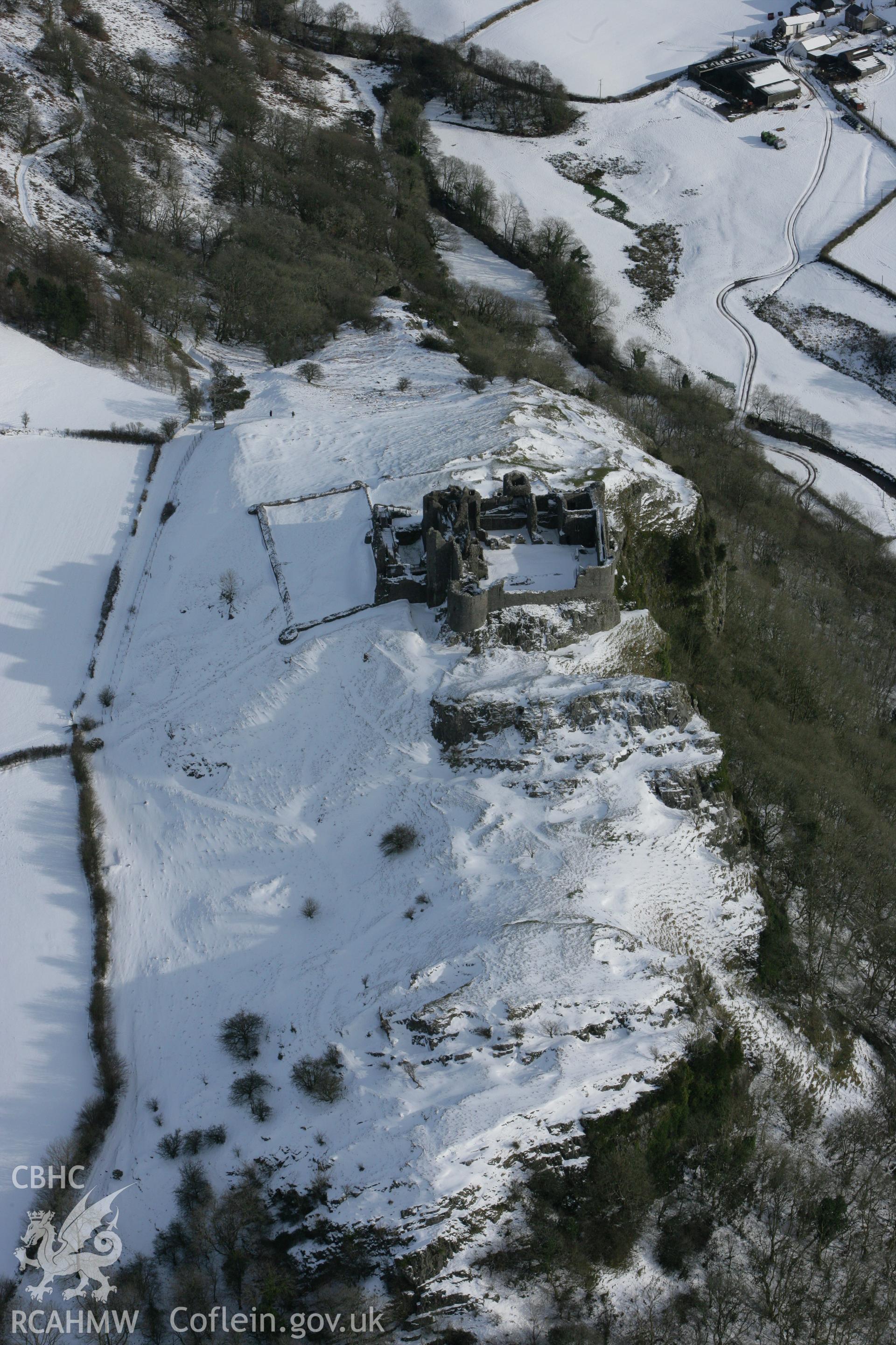 RCAHMW colour oblique photograph of Carreg Cennan Castle, under snow. Taken by Toby Driver on 06/02/2009.