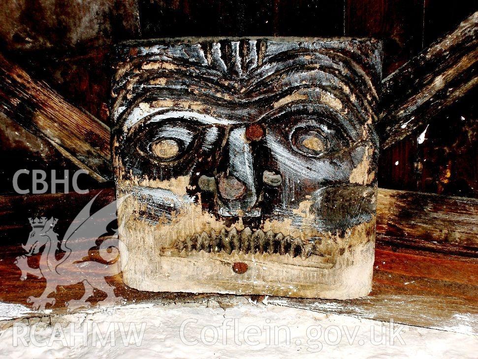 Digital colour photograph of carved face at St Gwyddelan's Church, Dolwyddelan produced by W.T. Jones  2006.