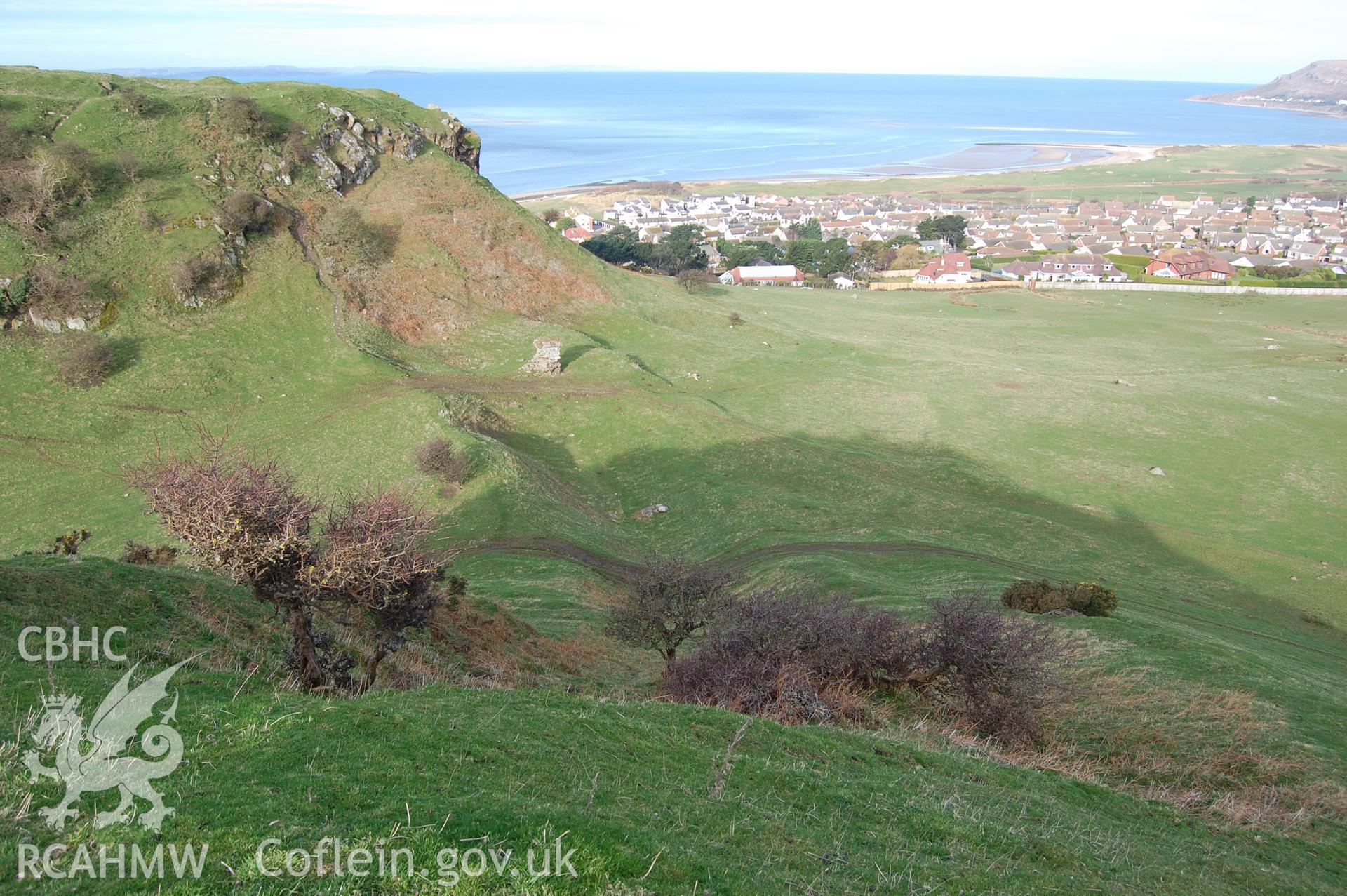 Digital photograph from an archaeological assessment of Deganwy Castle, carried out by Gwynedd Archaeological Trust, 2009. View down main N ditch from Mansel's Tower.