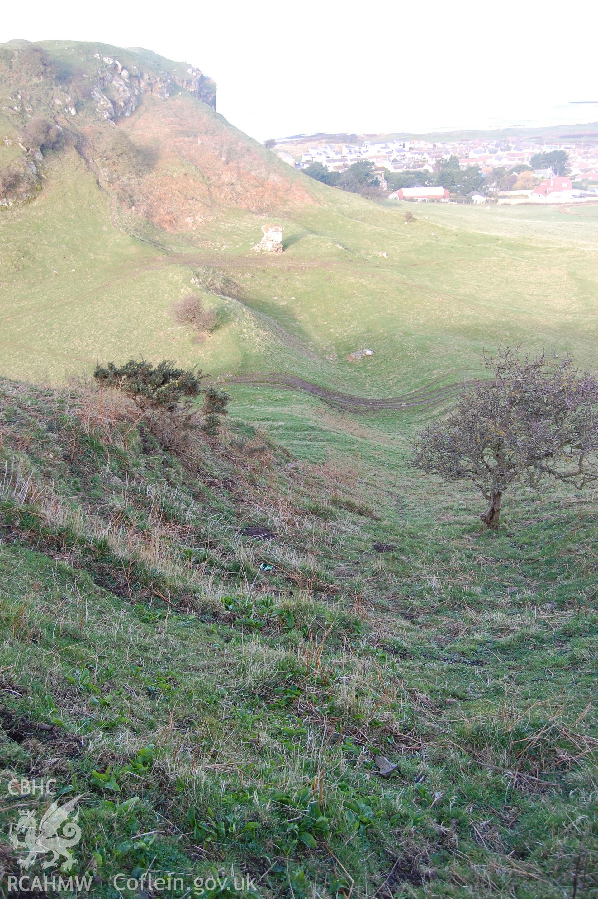 Digital photograph from an archaeological assessment of Deganwy Castle, carried out by Gwynedd Archaeological Trust, 2009. View down main N ditch from Mansel's Tower.