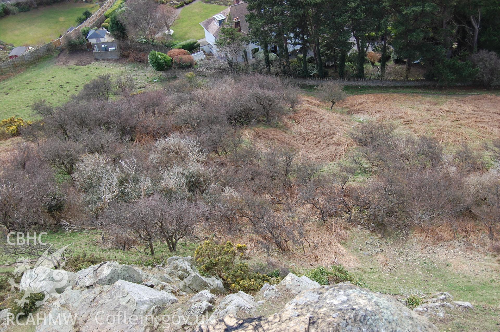 Digital photograph from an archaeological assessment of Deganwy Castle, carried out by Gwynedd Archaeological Trust, 2009. Construction inclines from above.