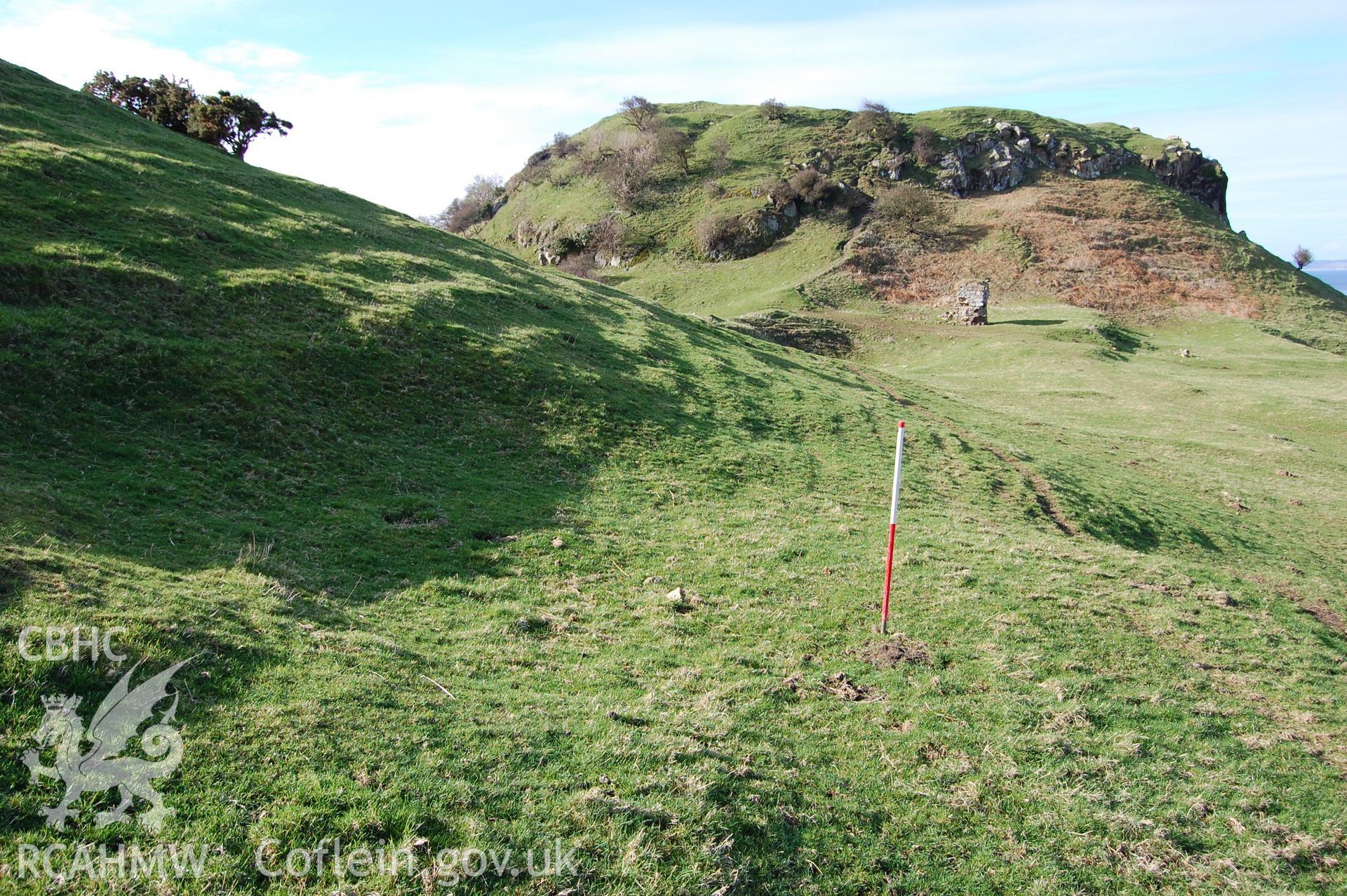 Digital photograph from an archaeological assessment of Deganwy Castle, carried out by Gwynedd Archaeological Trust, 2009. Building platform higher up slope.