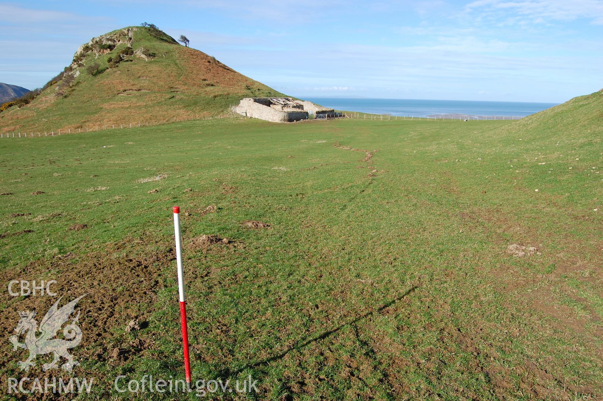 Digital photograph from an archaeological assessment of Deganwy Castle, carried out by Gwynedd Archaeological Trust, 2009. Looking up hollow-way towards castle.