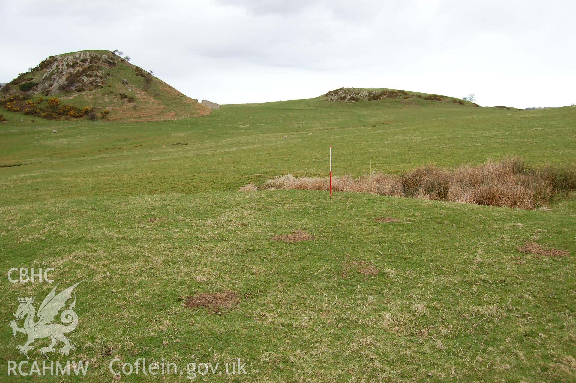 Digital photograph from an archaeological assessment of Deganwy Castle, carried out by Gwynedd Archaeological Trust, 2009. North end of house platform with spring.