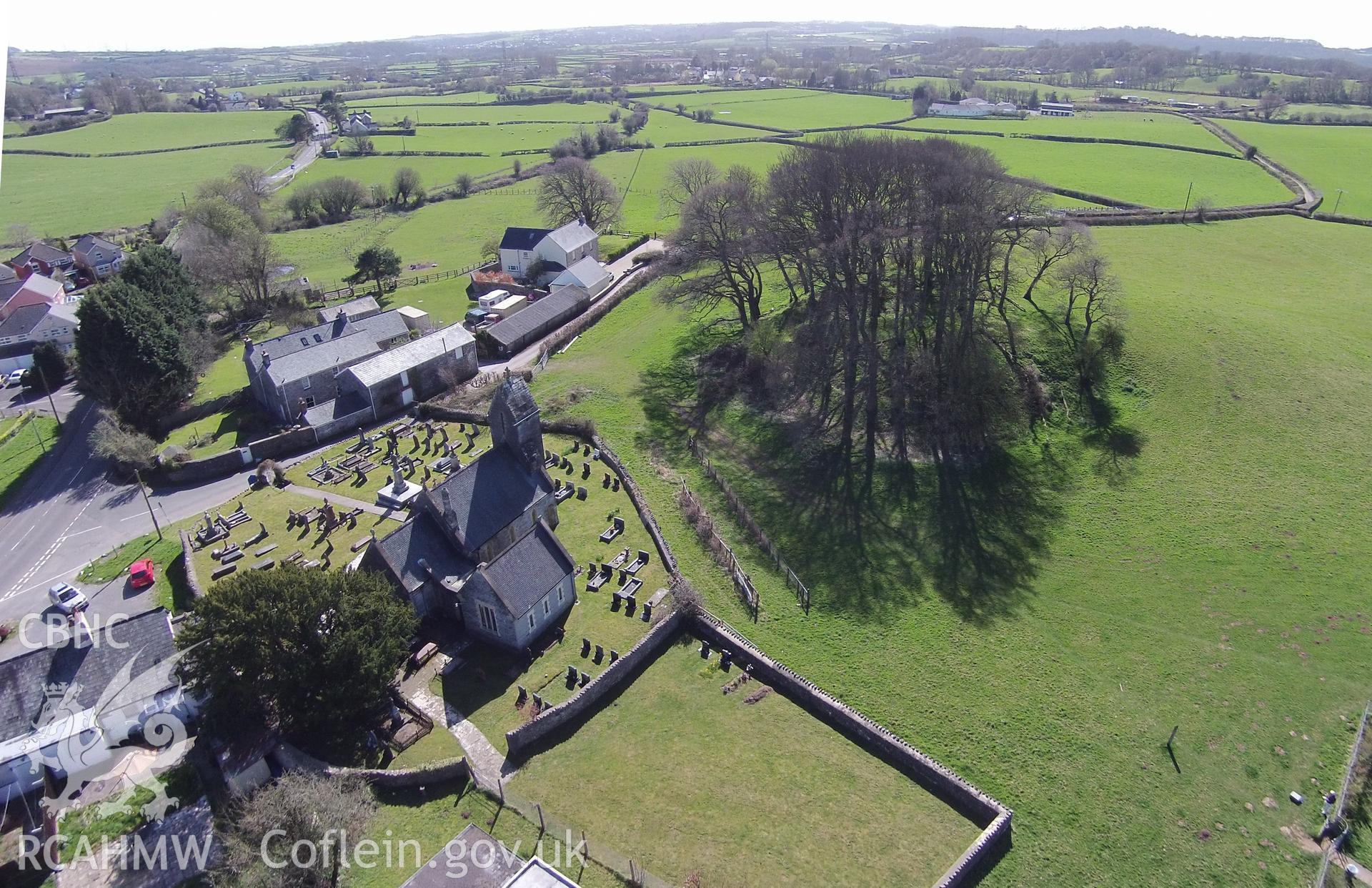 Digital aerial photograph showing Ystradowen castle mound and church.