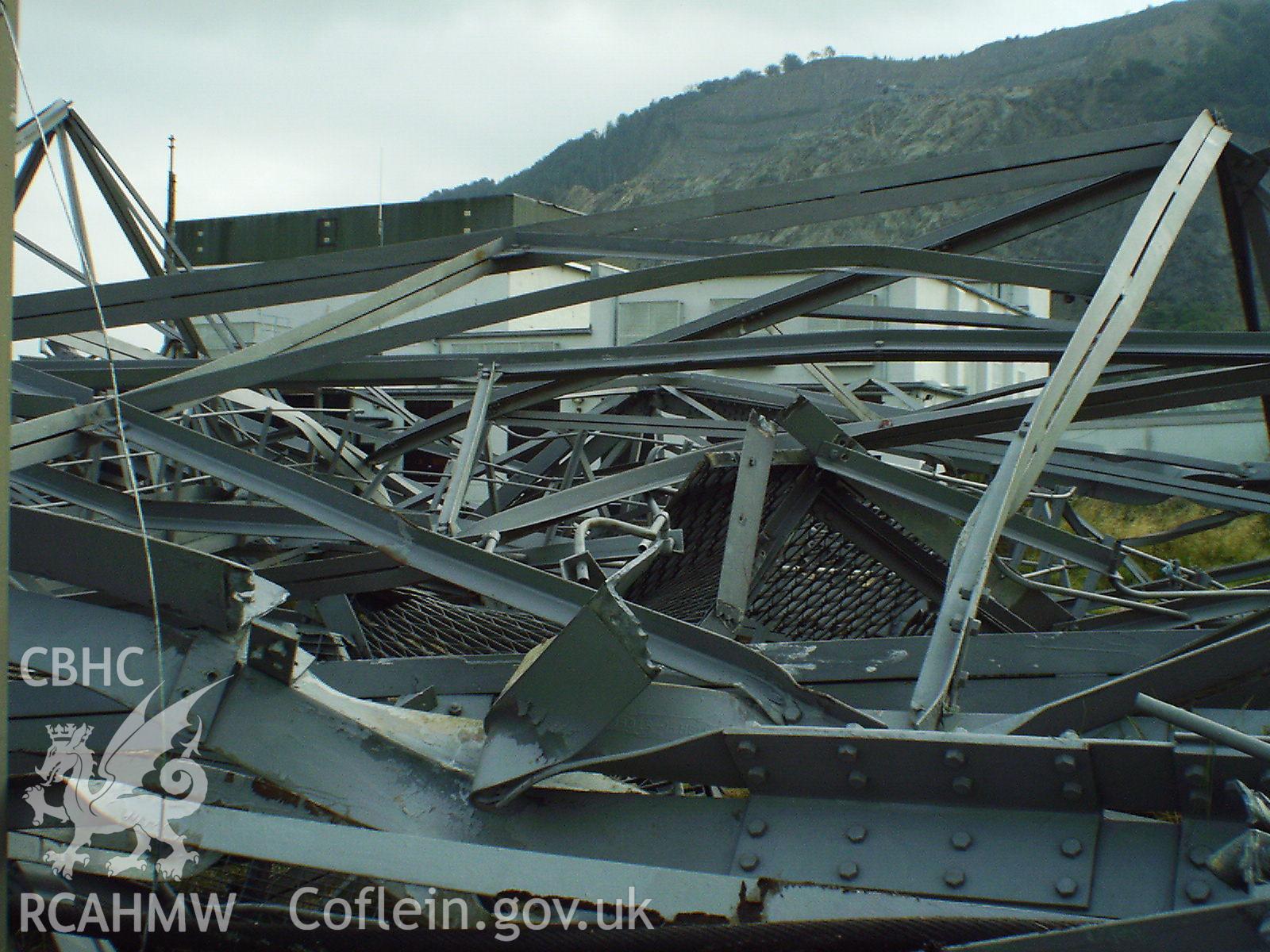 Colour digital photograph showing part of a demolished mast.