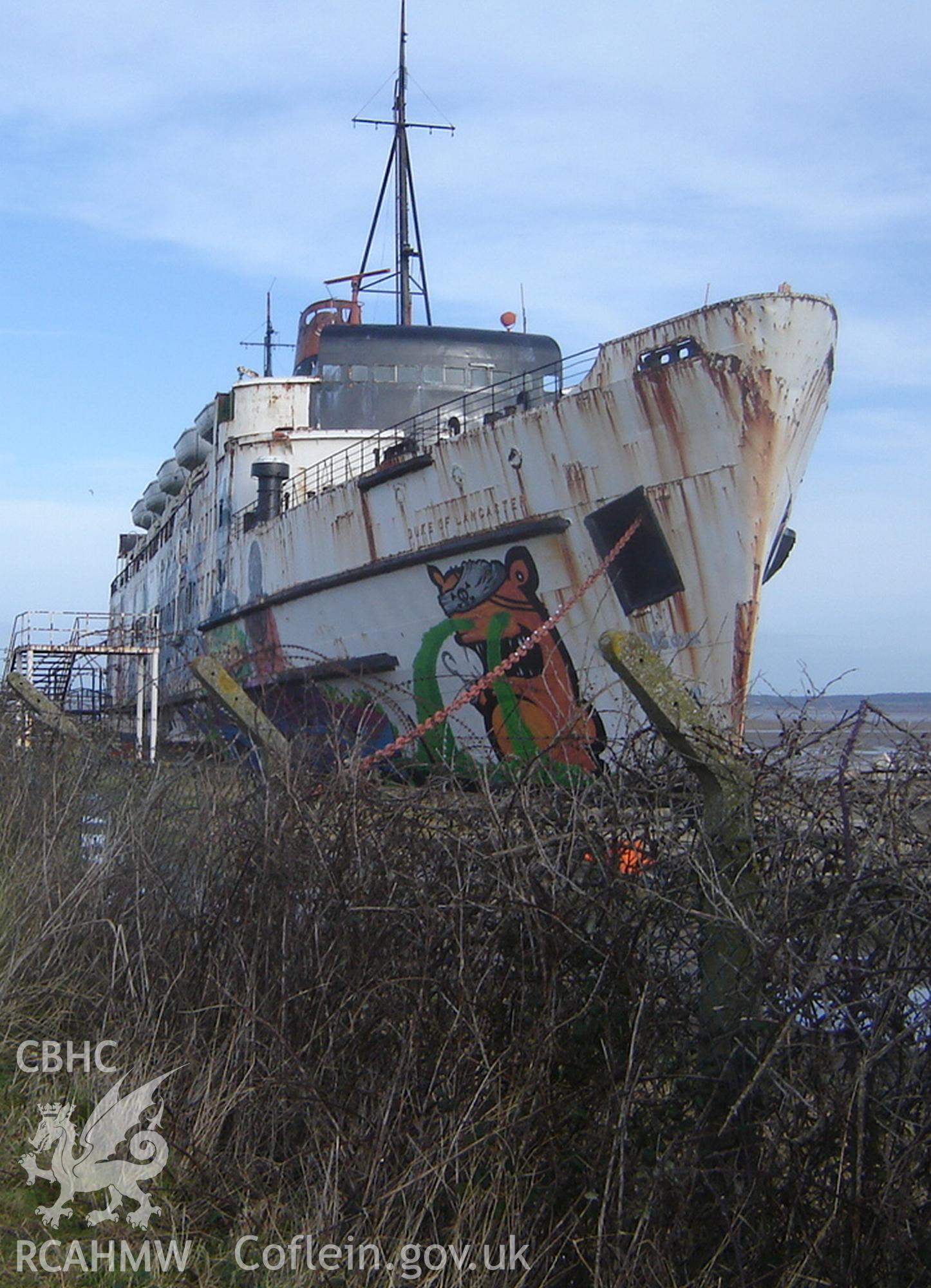 Panorama of the Duke of Lancaster showing graffitti on the ship's side