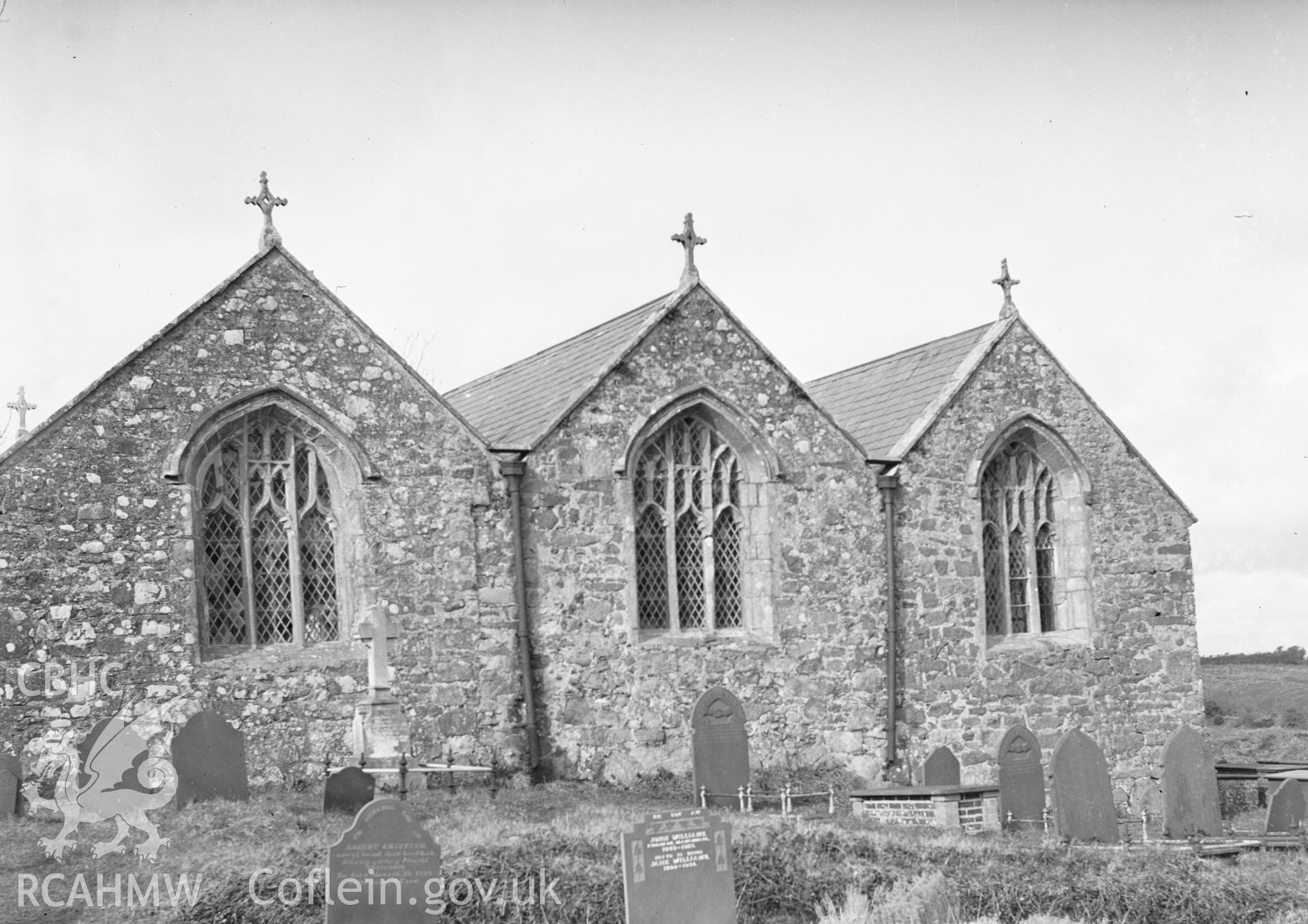 Black and white nitrate negative showing exterior view of Llangwnadl Church.