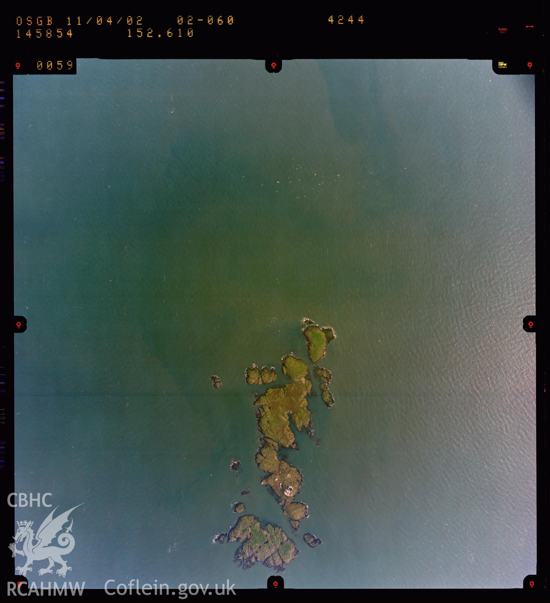Digitized copy of a colour aerial photograph showing the Skerries, taken by Ordnance Survey, 2002.