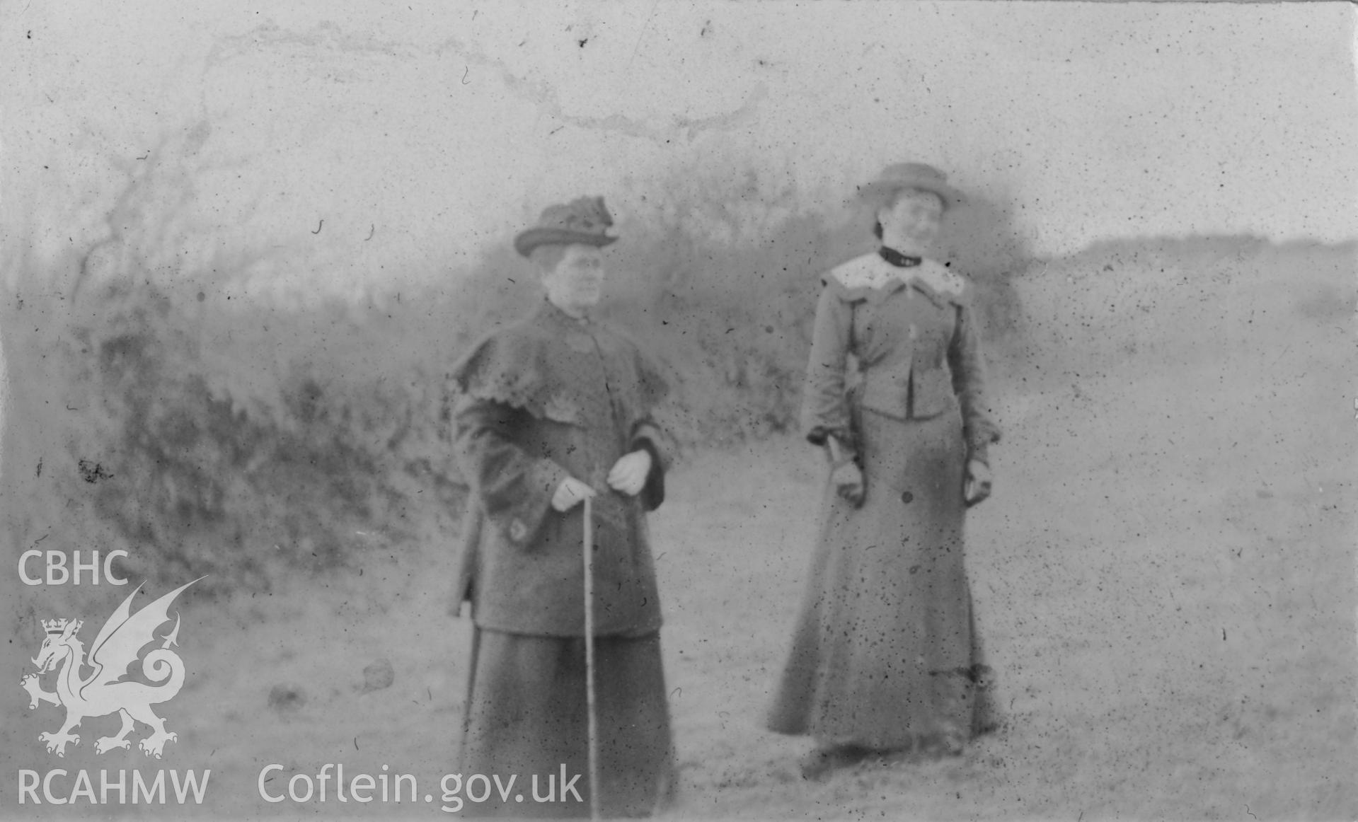 'At Pontardulais 1904'  two female figures. Digitised from a photograph album showing views of Aberystwyth and District, produced by David John Saer, school teacher of Aberystwyth. Loaned for copying by Dr Alan Chamberlain.