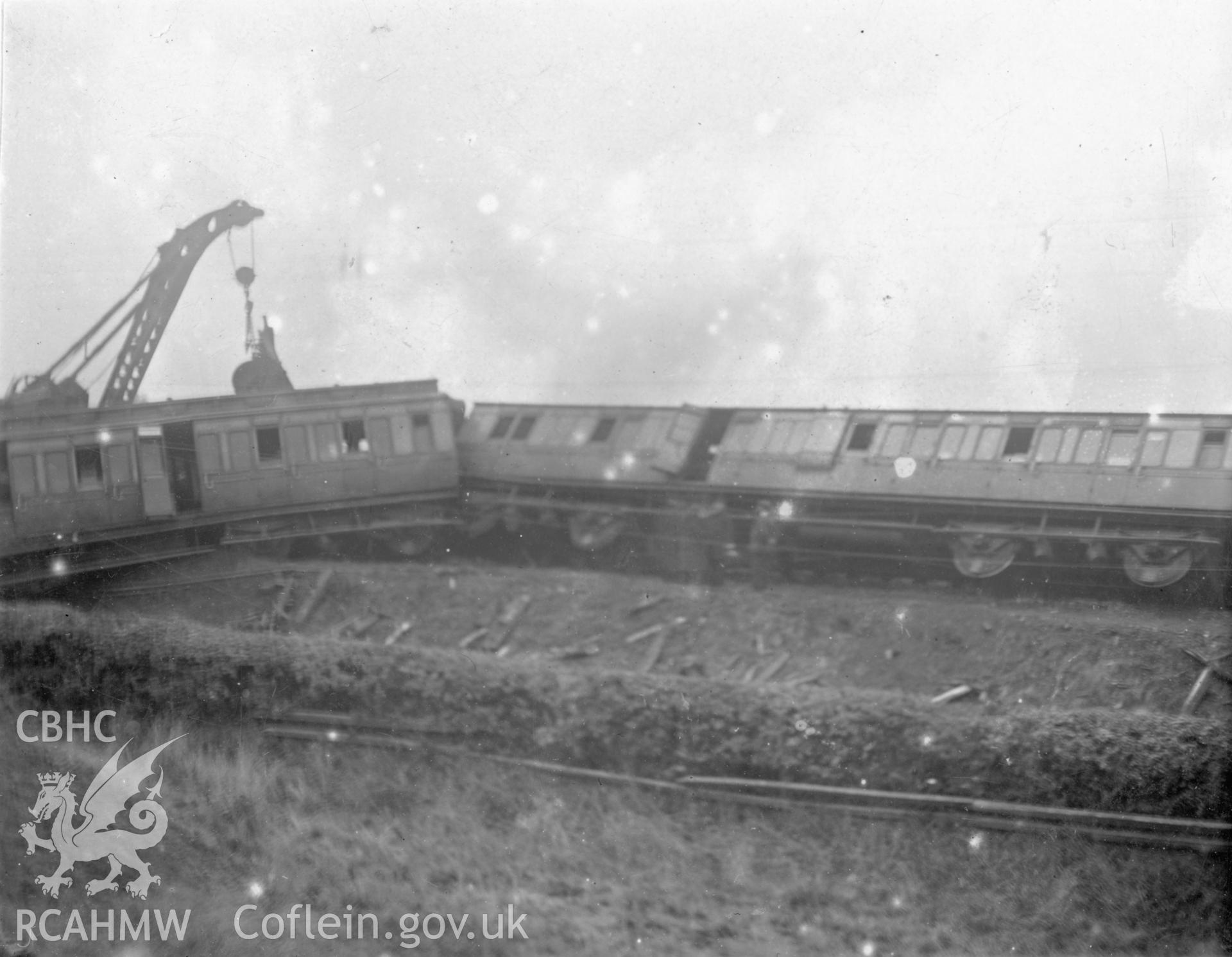 'GWR train wreck near Loughor 1904'.   Digitised from a photograph album showing views of Aberystwyth and District, produced by David John Saer, school teacher of Aberystwyth. Loaned for copying by Dr Alan Chamberlain.