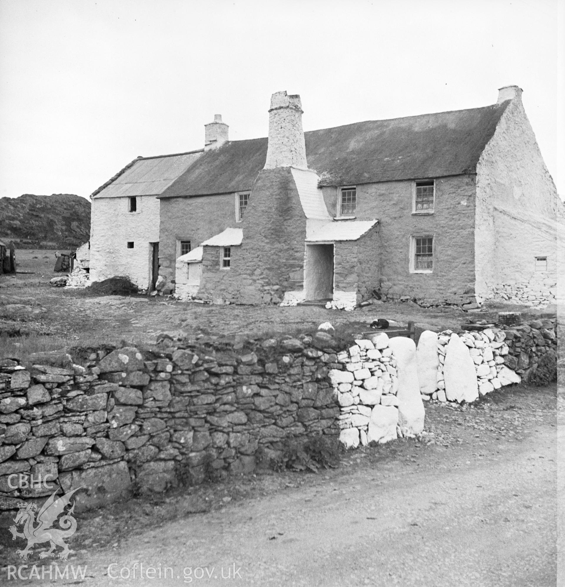 A black and white print of Rhosson Uchaf Farmhouse.