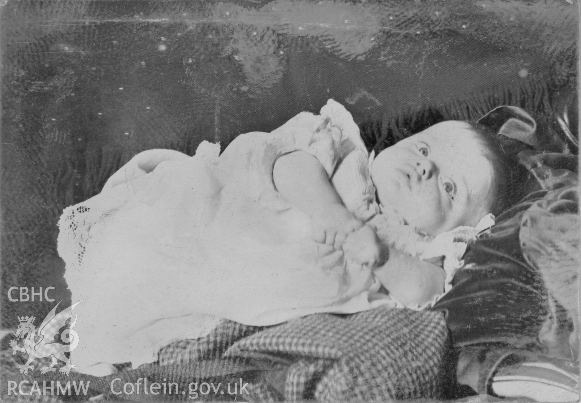 "G. at Eirianfa 1905". Photo of a baby. Digitised from a photograph album showing views of Aberystwyth and District, produced by David John Saer, school teacher of Aberystwyth. Loaned for copying by Dr Alan Chamberlain.