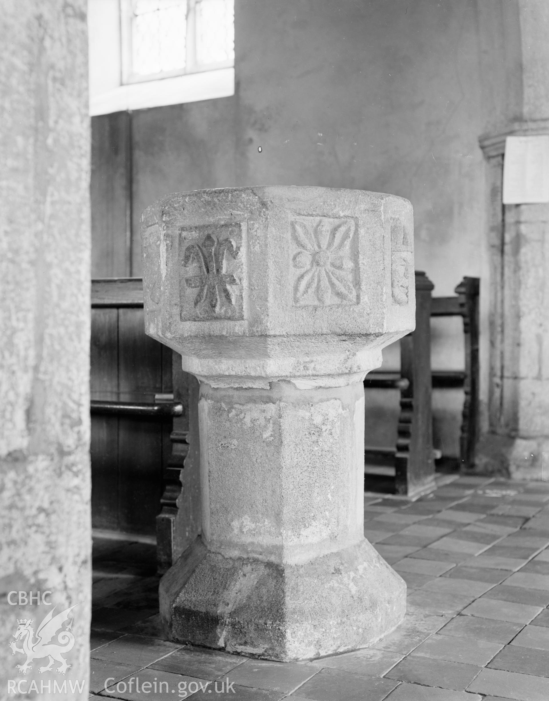Black and white nitrate negative showing the font at Llangwnadl Church.