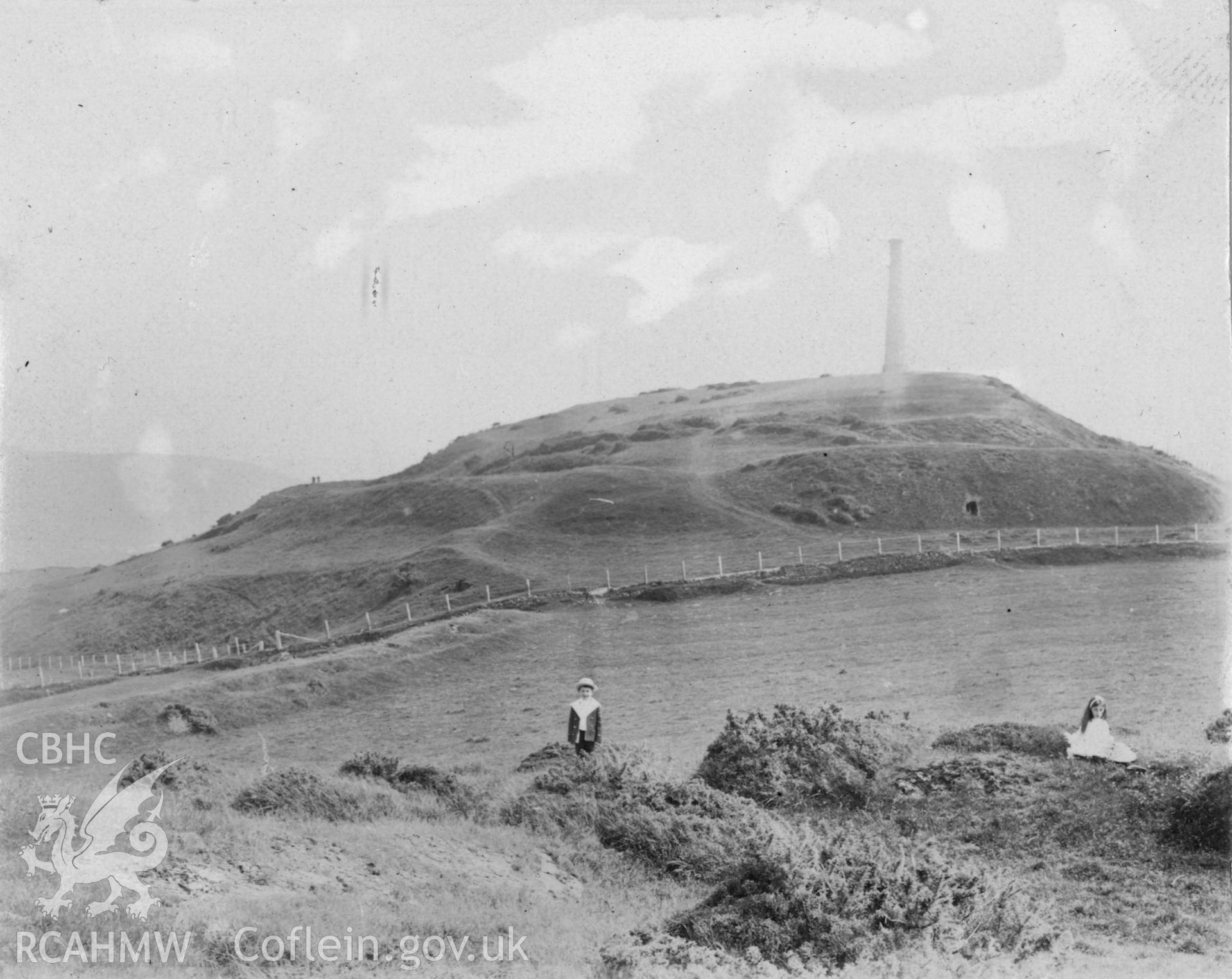"1910". Photo of children on Pen Dinas. Digitised from a photograph album showing views of Aberystwyth and District, produced by David John Saer, school teacher of Aberystwyth. Loaned for copying by Dr Alan Chamberlain.