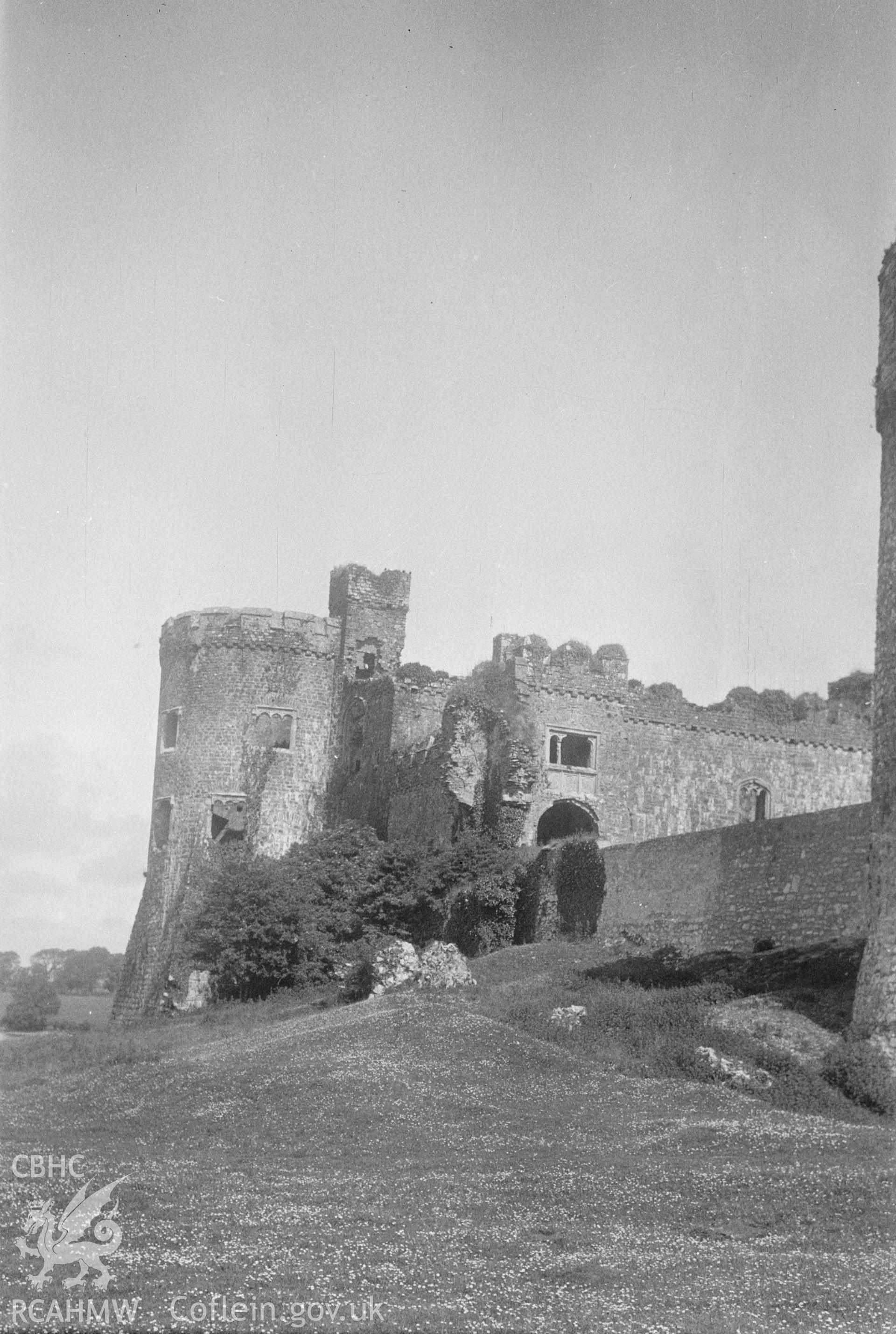 Black and white nitrate negative showing exterior view of Carew Castle.